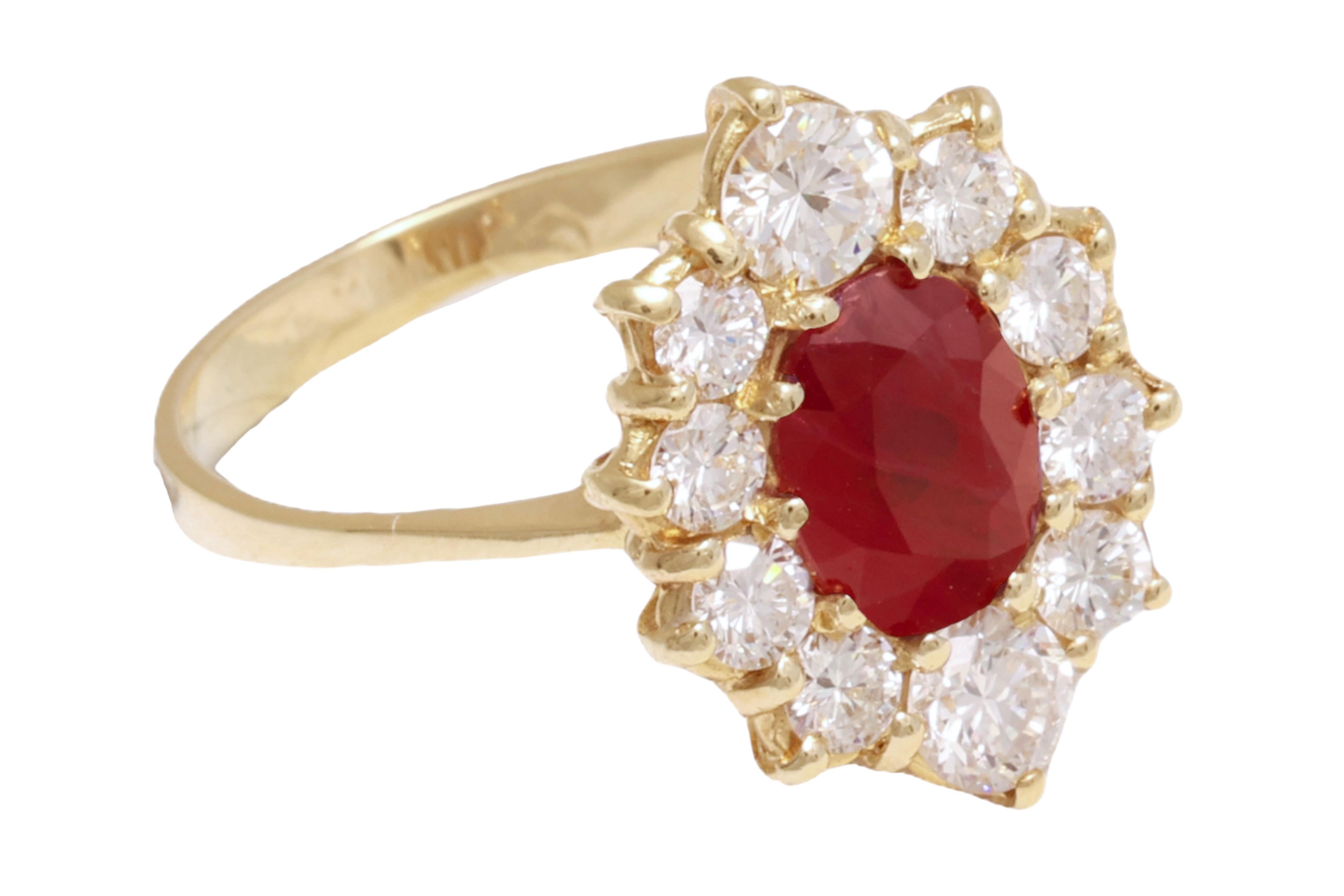 Stunning 18 kt Yellow Gold 1.71 Carat Ruby Ring with Diamonds

Ruby: 1.71 Carat, Length 5.7 x height 7.7 mm

Diamonds: 10 brilliant cut diamonds, Nice clarity and cut together 1 ct.

Material: 18 kt yellow gold

Total weight: 4.6 gram / 0.165 oz /