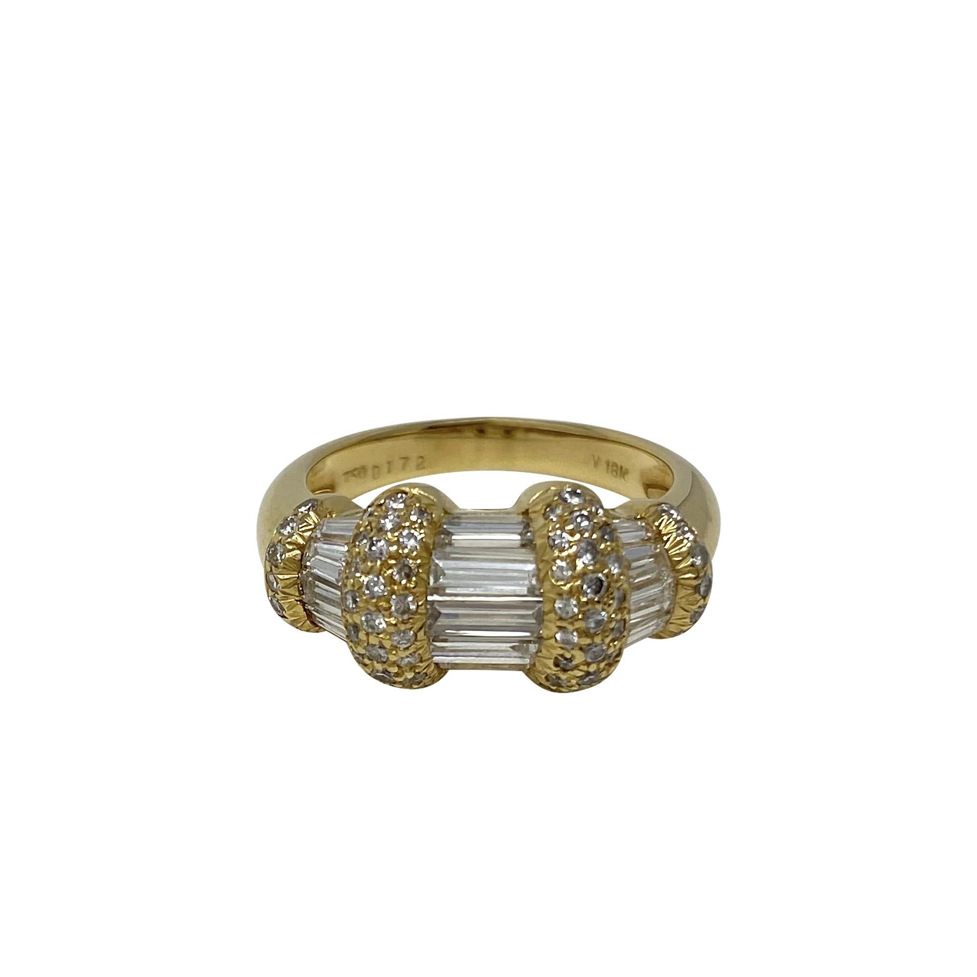 Such a beauty - for either hand!  This 18 karat yellow gold ring supports 1.72 cts of baguette and round diamonds and is a size 6 1/2. Buy this sparkler for yourself!  What a treat!