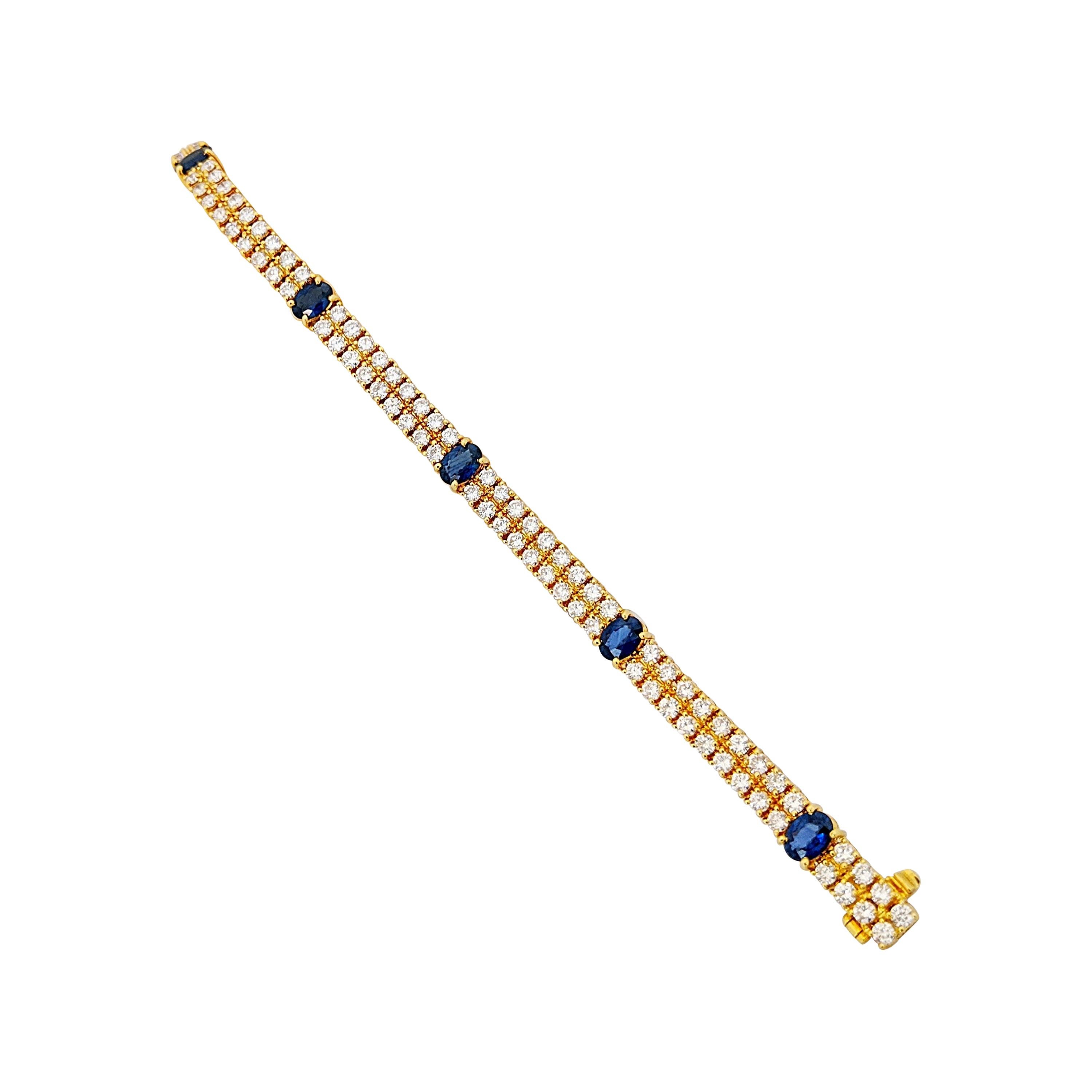 18 Karat Yellow Gold, 2-Row Diamond Bracelet with 3.19 Carat Oval Blue Sapphires For Sale