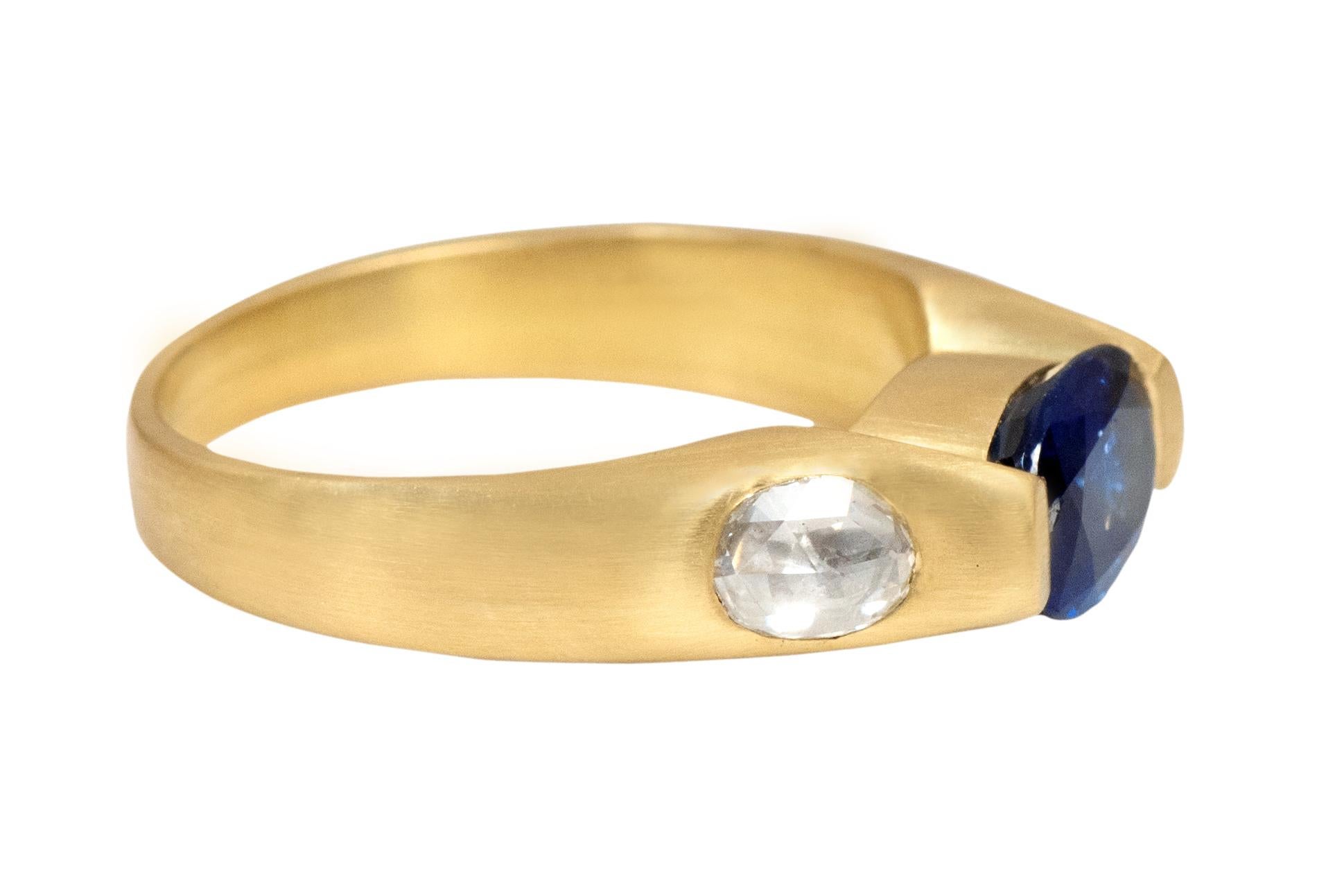 18 Karat Yellow Gold 2.07 Carat Sapphire and Diamond Three-Stone Ring

This fabulous trinity cornflower sapphire and diamond rose cut ring is elegant. The three-stone trinity ring tells a story by not only representing the said “past, present, and