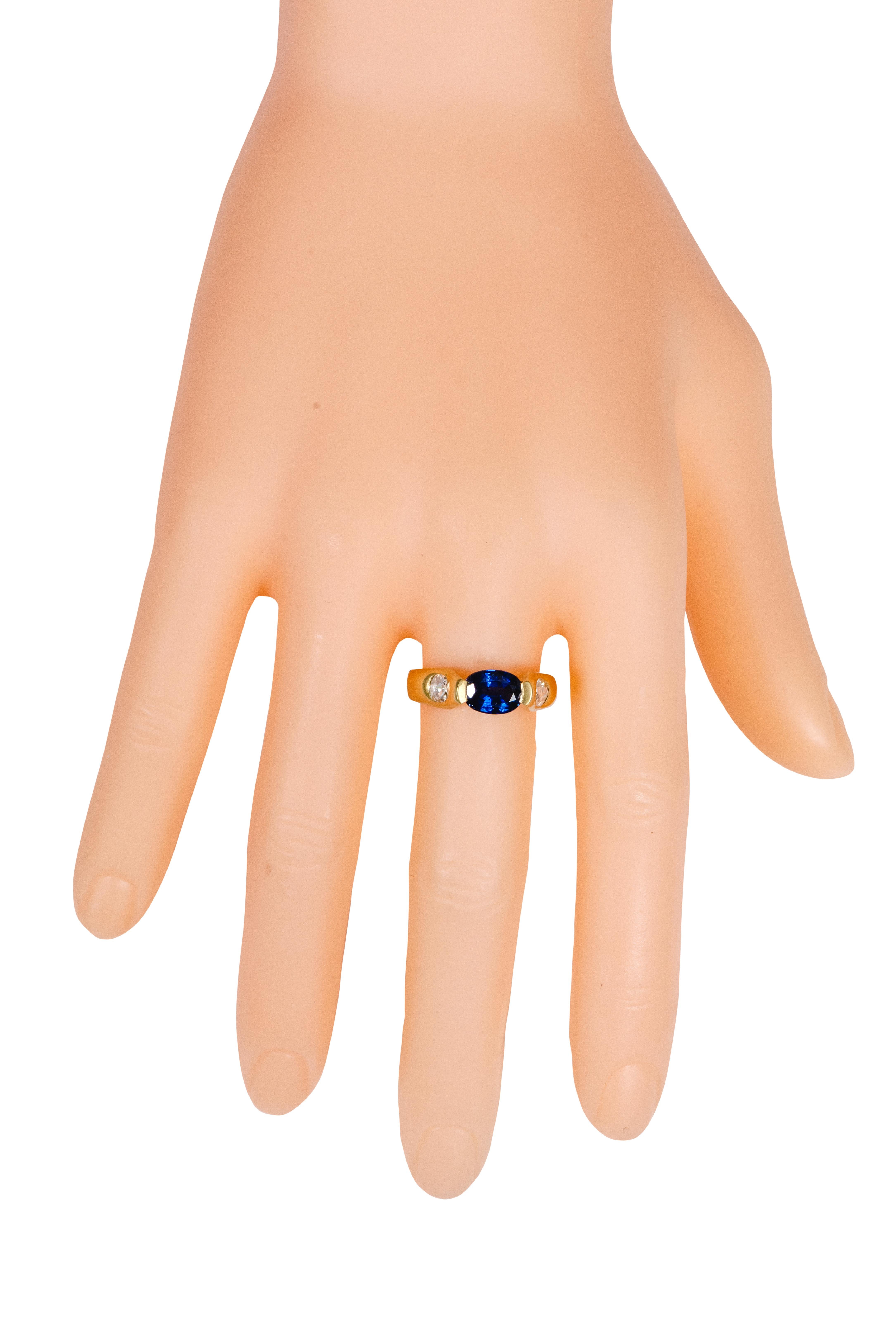 Modern 18 Karat Yellow Gold 2.07 Carat Sapphire and Diamond Three-Stone Ring For Sale