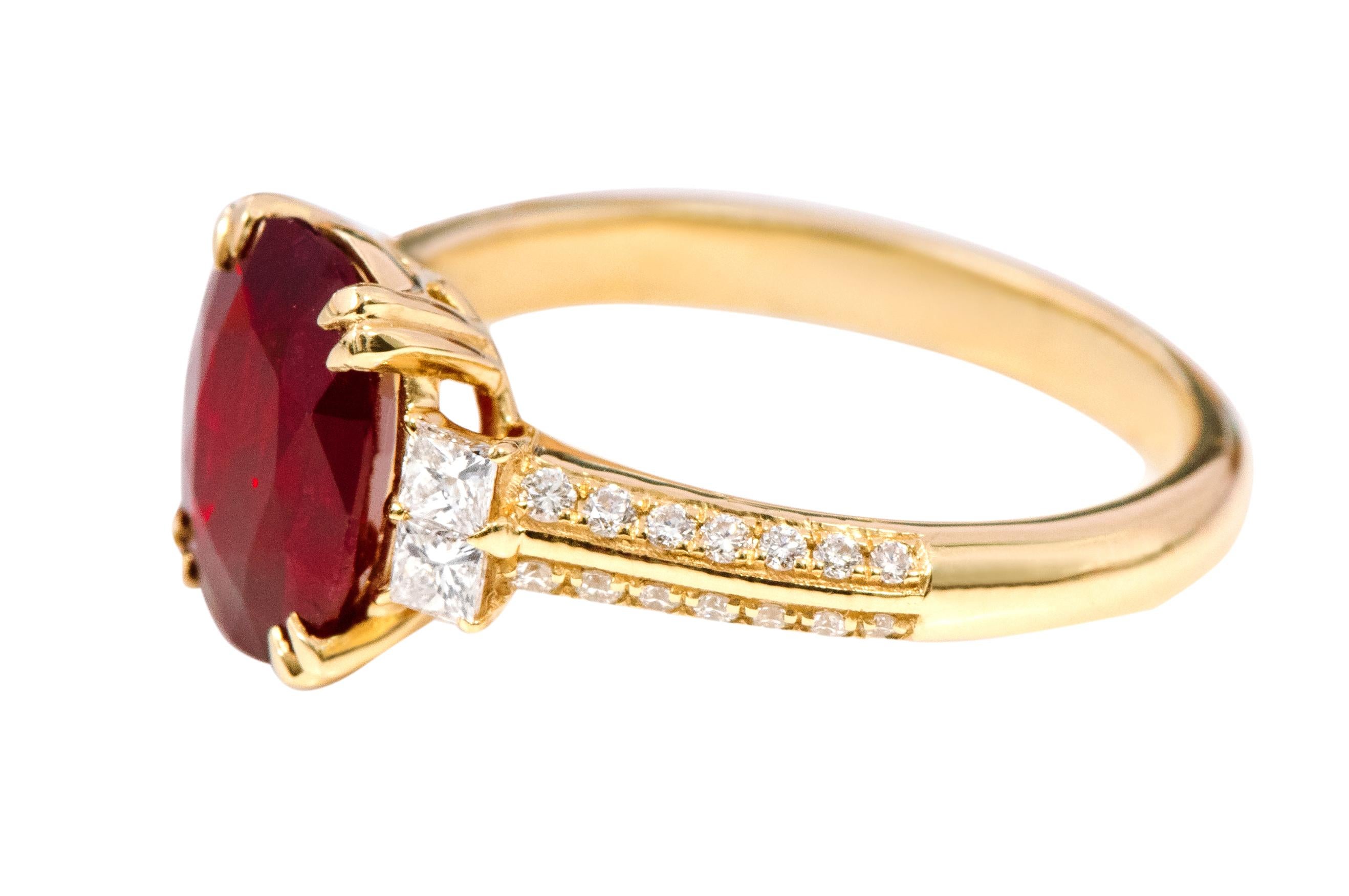 18 Karat Yellow Gold 2.70 Carat Oval-Cut Ruby and Diamond Solitaire Ring

This glorious wine red ruby and diamond ring is sensational. The conceptual three-stone trinity ring tells a story by not only representing the said “past, present, and