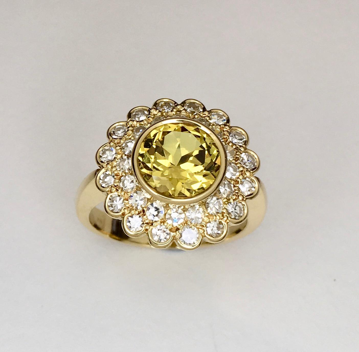 18 Karat Yellow Gold 2.95 Carat Yellow Sapphire Diamond Double Cluster Ring

Stunning Classic design handcrafted in 18kt yellow gold. This is a double rowed diamond cluster ring. Center stone is a bright round Australian yellow sapphire secured in a