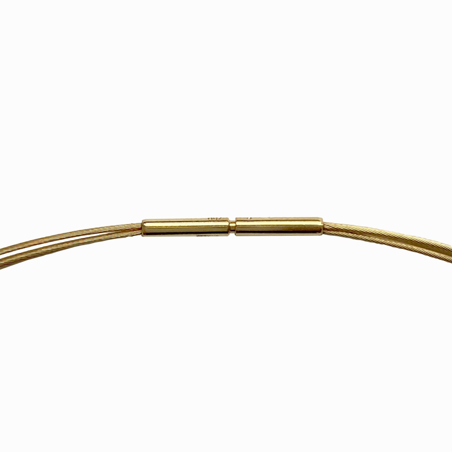 Ce magnifique collier multi-brins texturé est fabriqué à partir de fils d'or jaune 18 carats. Il est composé de 3 brins et mesure 16