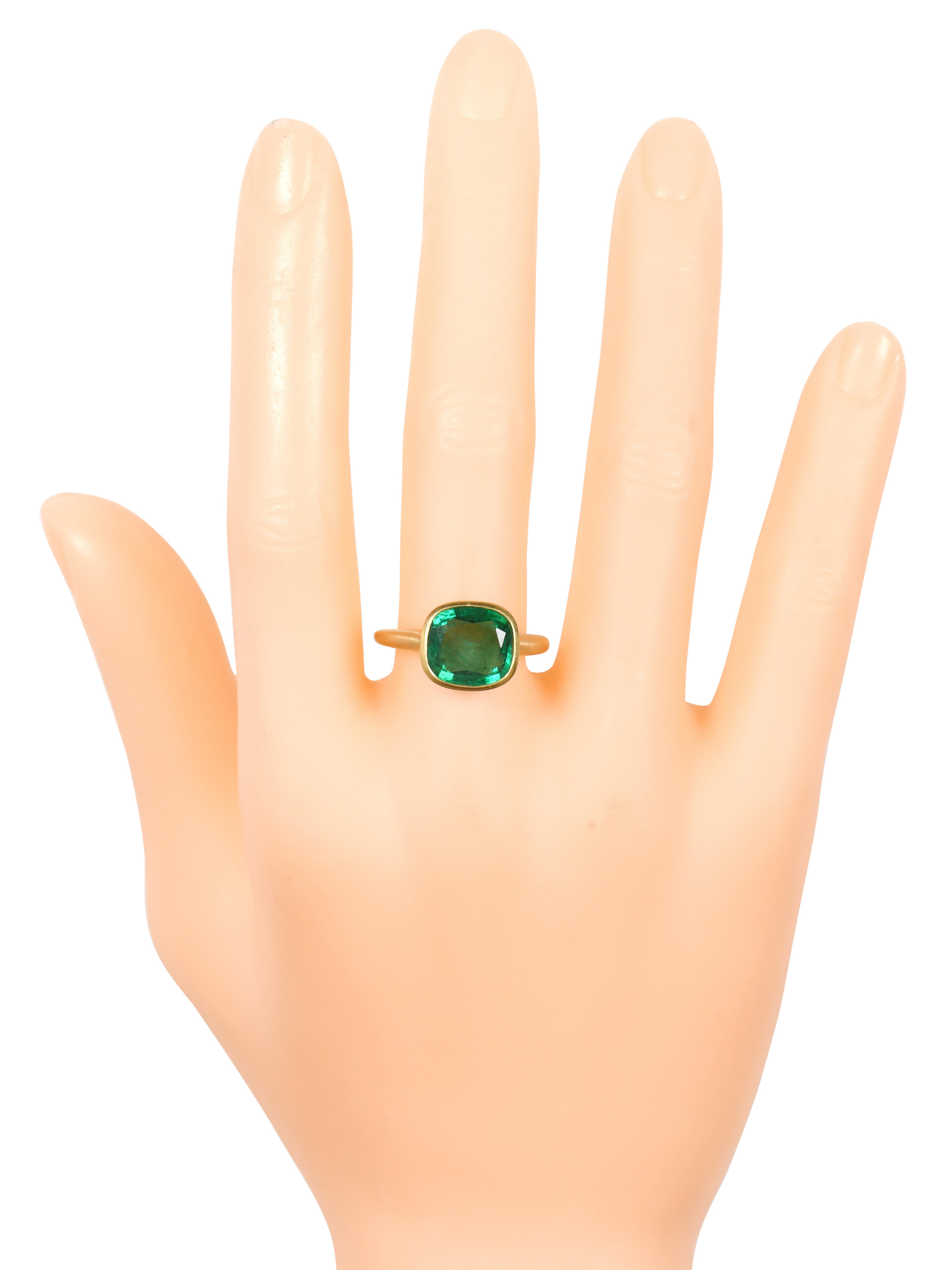 18 Karat Yellow Gold 3.20 Carat Cushion-Cut Natural Emerald Solitaire Ring

This exemplary parakeet green emerald ring is truly fantastic. It’s a specially cushion cut deep green emerald enclosed in matt finish Italian yellow gold in the evenly