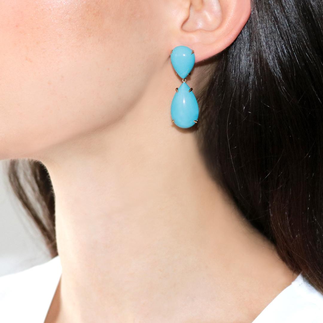 One of a kind Stabilized Sleeping Beauty Turquoise earrings set in 18kt yellow gold.

The weight of each earring is light and will not pull down the ear and it is designed specifically for maximum comfort.

Stabilized Sleeping Beauty Turquoise: