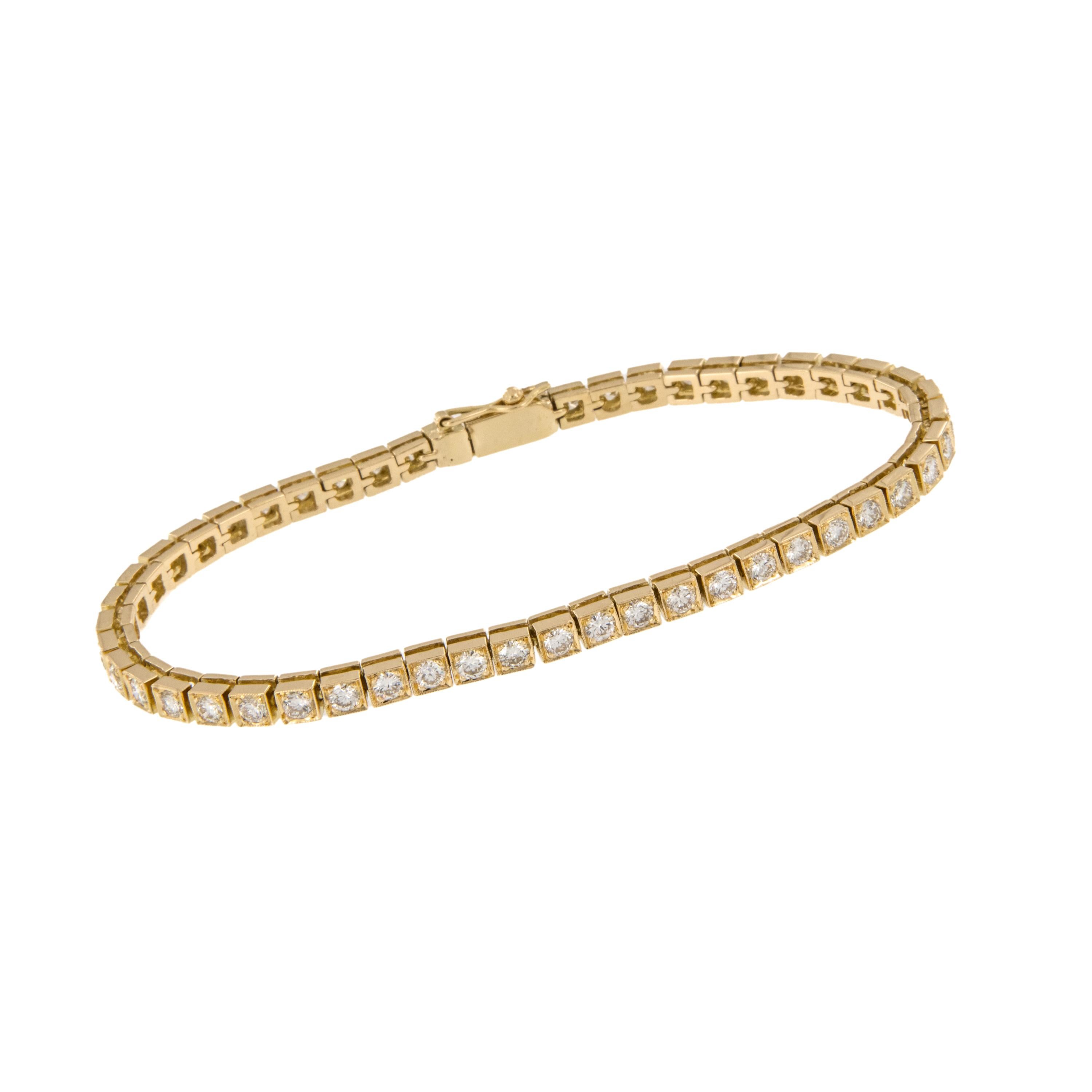 You can't get more timeless than this beautiful 18 karat yellow gold diamond tennis bracelet ; one of the essential staples for all, whether you are a fashionista, career woman, mom or jet setter - this bracelet is for you! Individually set milgrain