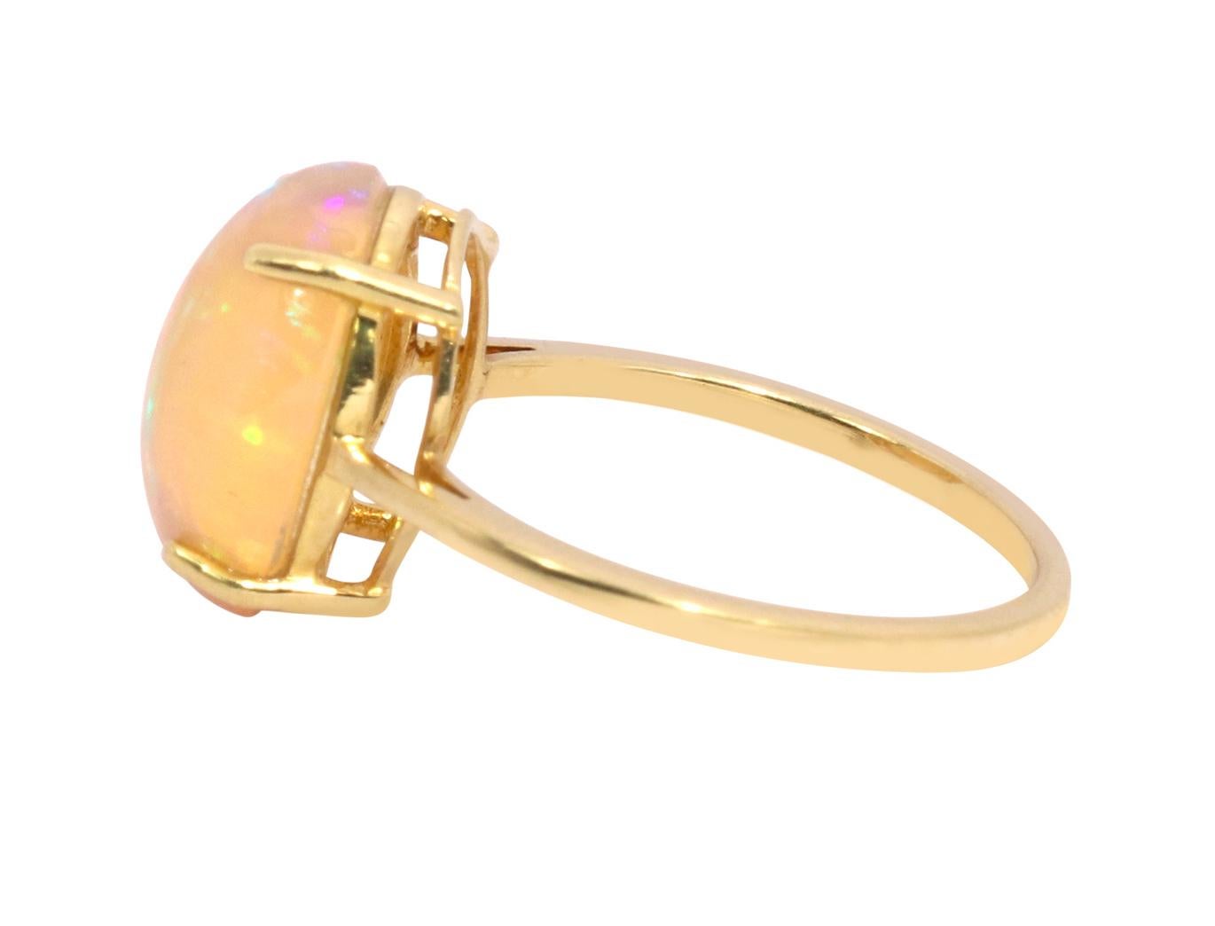 Modern 18 Karat Yellow Gold 3.71 Carat Opal Solitaire Ring For Sale