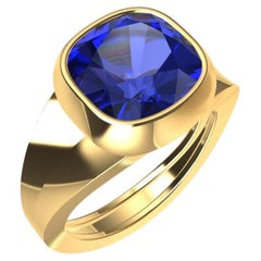 18 Karat Yellow Gold 4.0 Carat Vivid Cushion Cut Blue Sapphire Sculpture Ring