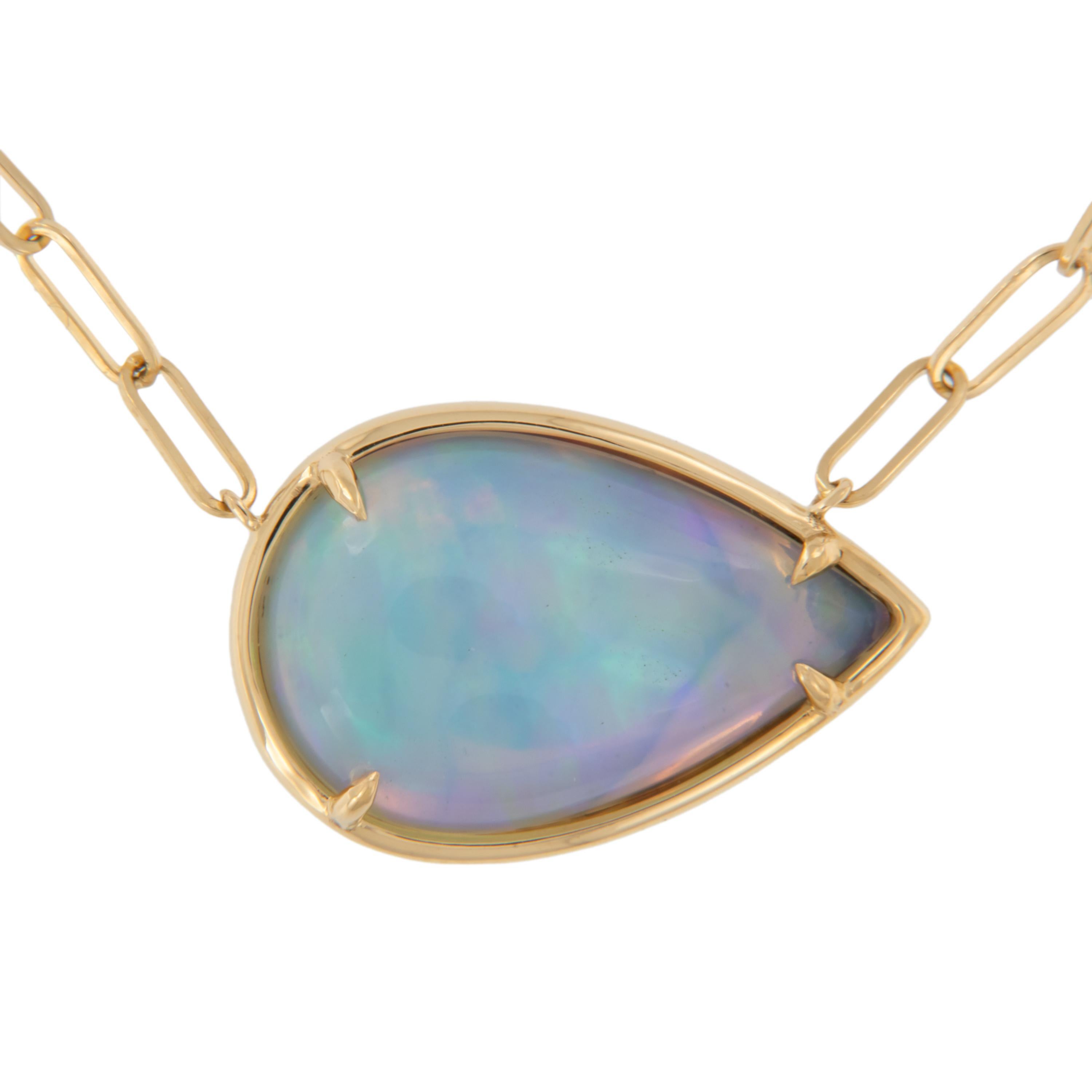 Breathtaking jelly opal with beautiful blue & green play of colors takes center stage in this solitaire necklace with a spin - the pear shaped cabochon opal is set horizontal for a classic yet unique look! Crafted from rich 18 karat yellow gold and