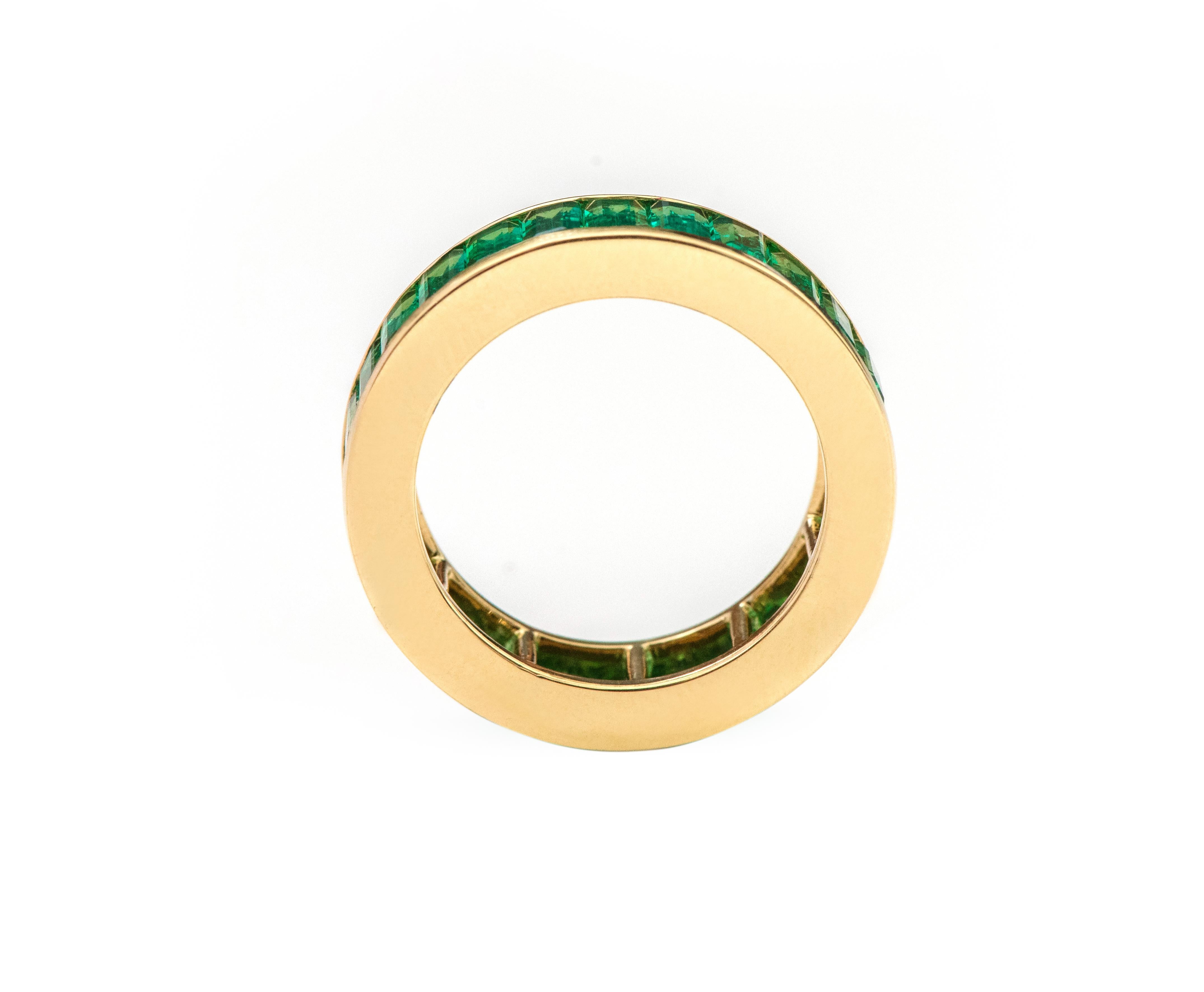 green emerald eternity ring