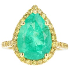 18 Karat Yellow Gold 5.92 Carat Colombian Emerald and Vivid Yellow Diamond Ring