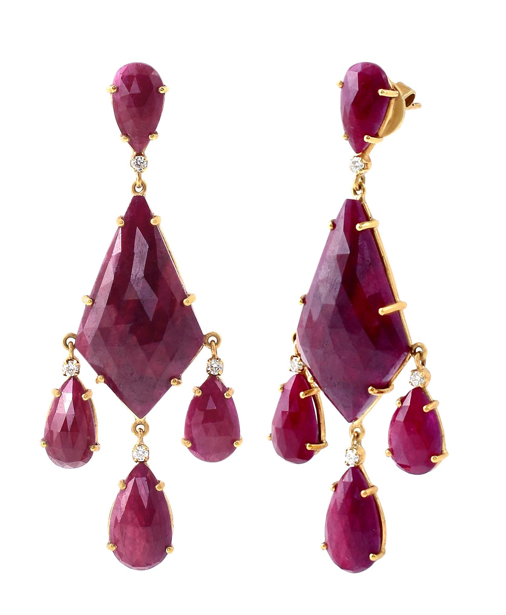 18 Karat Yellow Gold 59.98 Carat Ruby and Diamond Cocktail Dangle Earrings

This magnificent scarlet red and diamond long slice hanging earring is phenomenal. The solitaire long kite shaped faceted slice ruby in 6-grain prong setting in the center