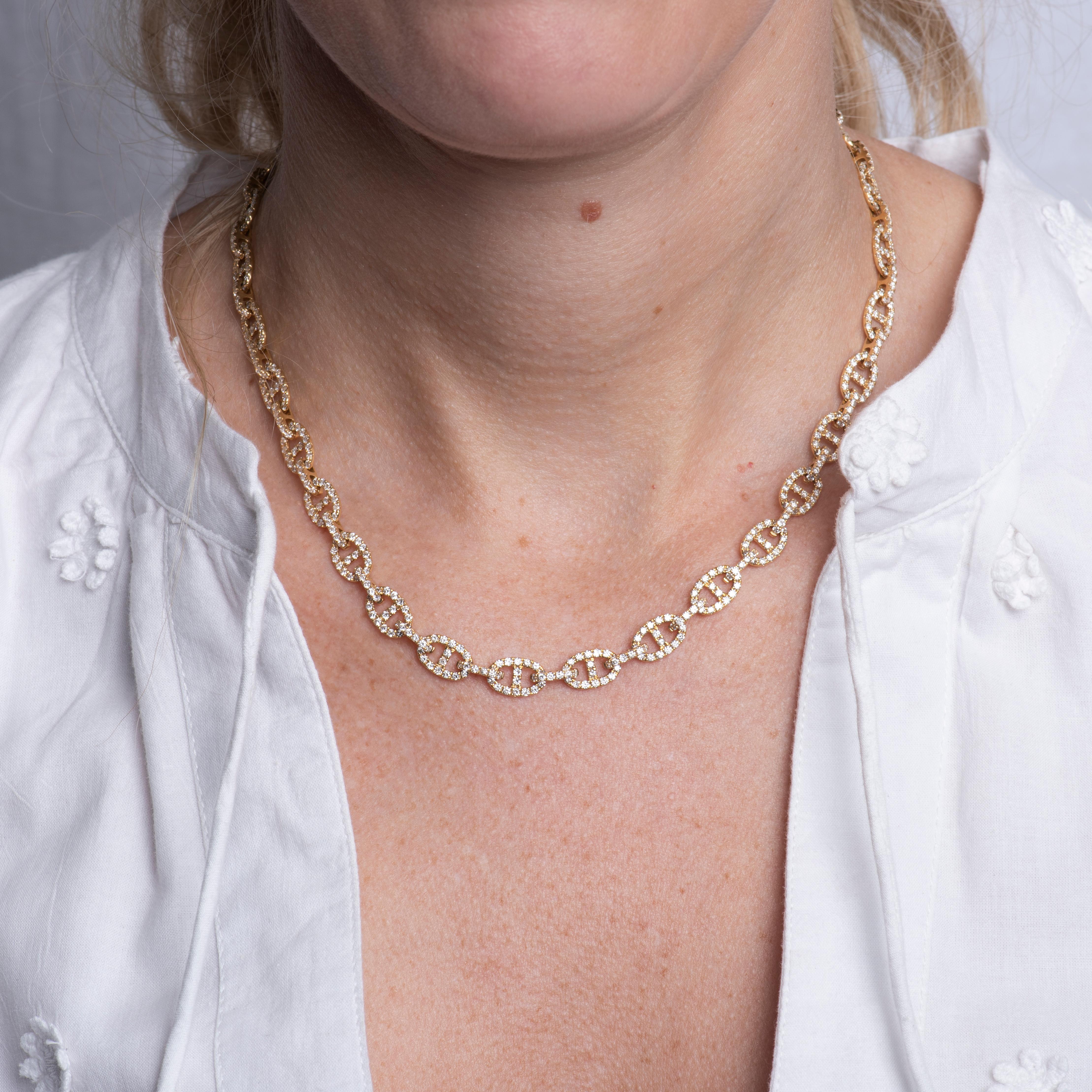 This link necklace features 6.22 carat total weight in round natural diamonds set in 18 karat yellow gold. Box clasp with safety closure. Wear alone of layer with other necklaces for a unique look. 
Measurements: Length approximately 16