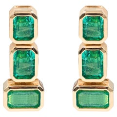 18 Karat Yellow Gold 6.53 Carat Natural Emerald-Cut Emerald Dangle Earrings