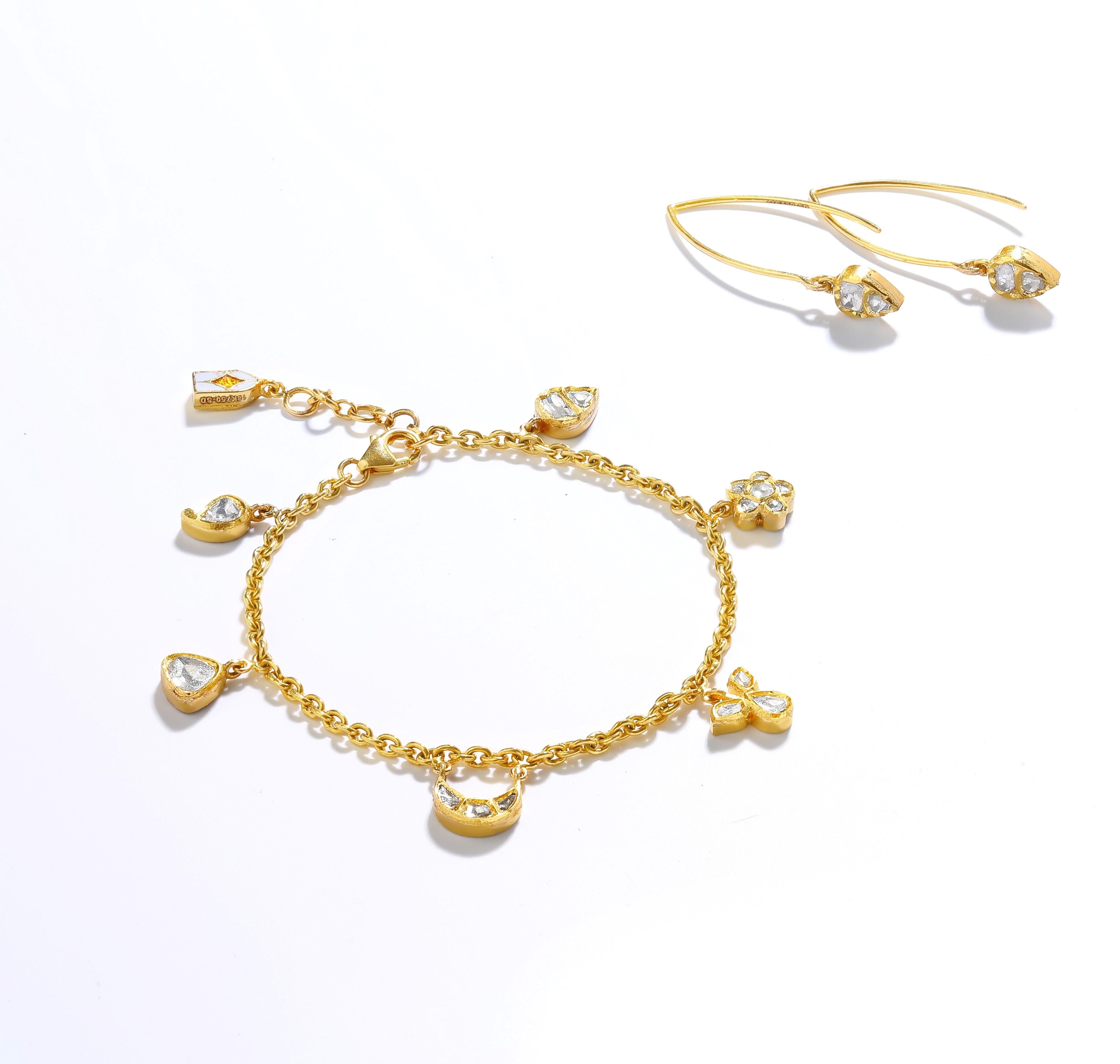 18 Karat Yellow Gold 7 Motif Charm Bracelet with Uncut Diamonds For Sale 2