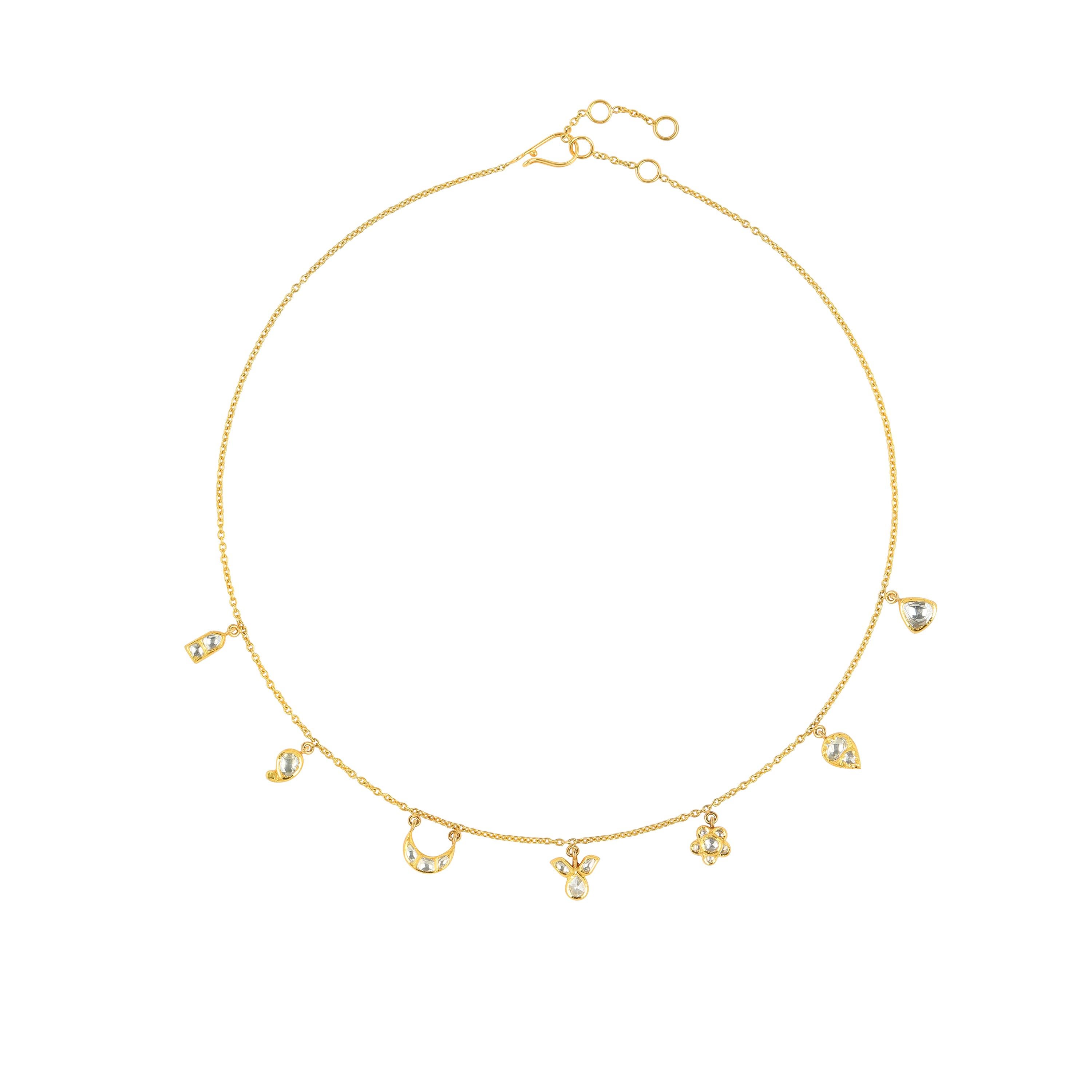 Women's 18 Karat Yellow Gold 7 Motif Charm Bracelet with Uncut Diamonds For Sale