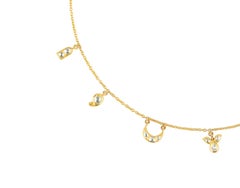 18 Karat Yellow Gold 7 Motif Drop Necklace with Uncut Diamonds