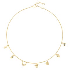 18 Karat Yellow Gold 7 Motif Drop Necklace with Uncut Diamonds