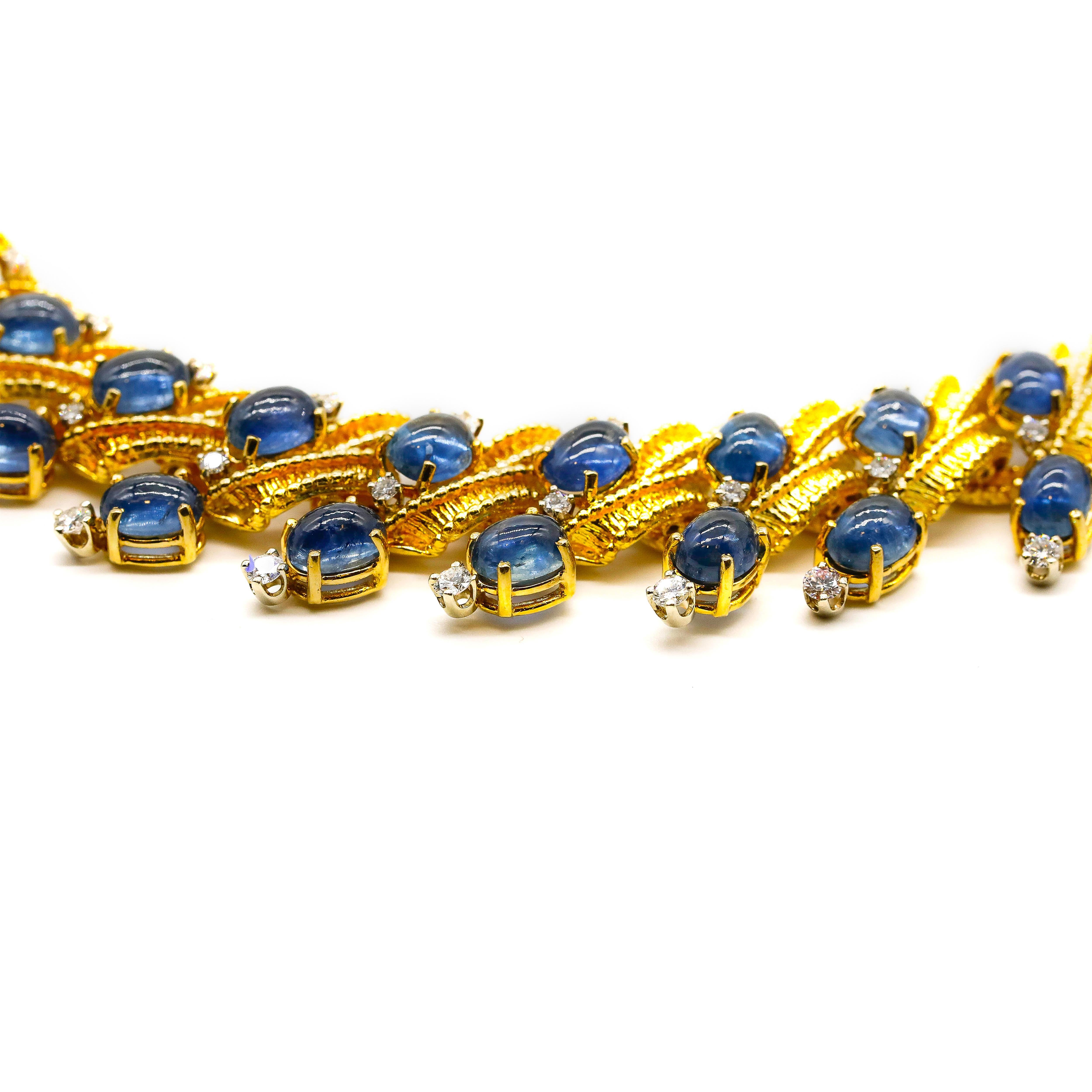 18 Karat Yellow Gold 72 Carat Blue Sapphire and 4.5 Carat Diamond Necklace 

Classic timeless necklace that is very fluid and lays nicely . Good  to wear for a special occasion or out to lunch with ladies. 72 ct cabochon blue sapphires and 4.5 ct