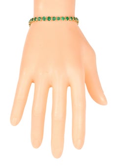 18 Karat Gelbgold 8,27 Karat Smaragd-Tennisarmband in Lünettenfassung