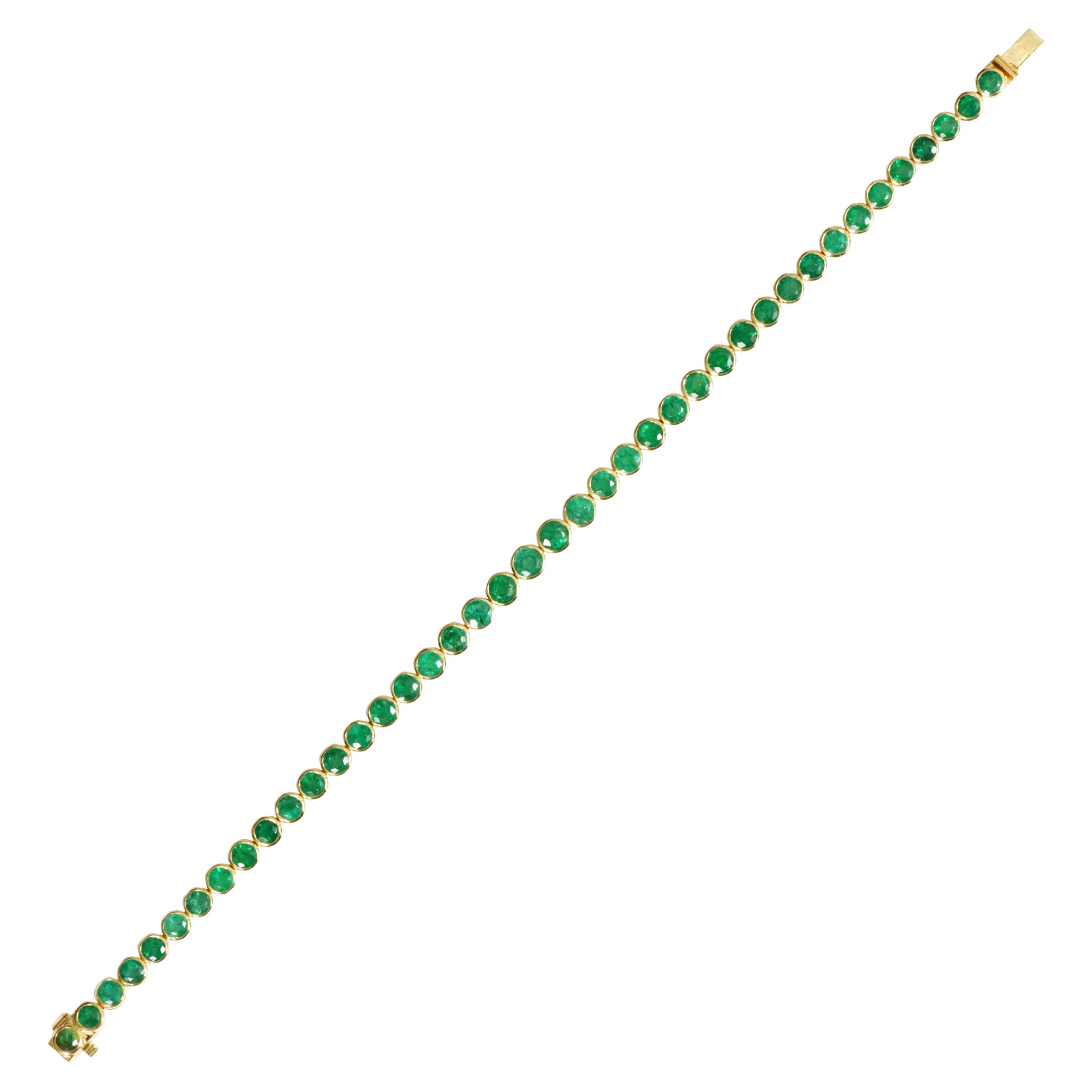 Bracciale tennis in oro giallo 18 carati con smeraldo da 8,27 carati con castone