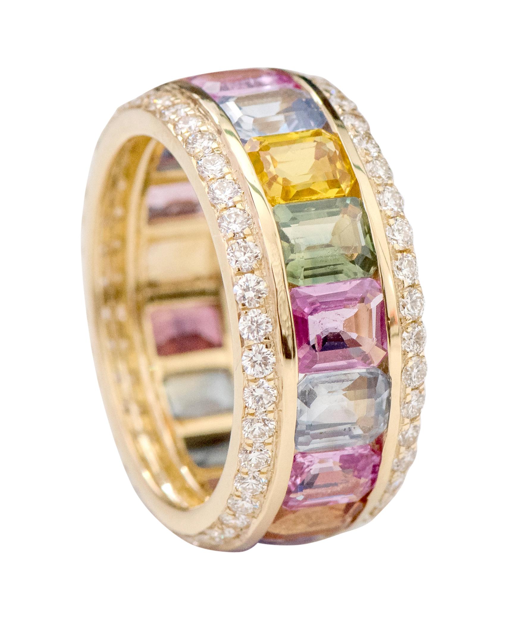18 Karat Yellow Gold 8.62 Carat Emerald-Cut Multi-Sapphire and Diamond Eternity Band Ring

This magnanimous rainbow multi-sapphire and diamond band is ingenious. The solitaire horizontally placed emerald-cut multi-sapphires in a side-bezel closed