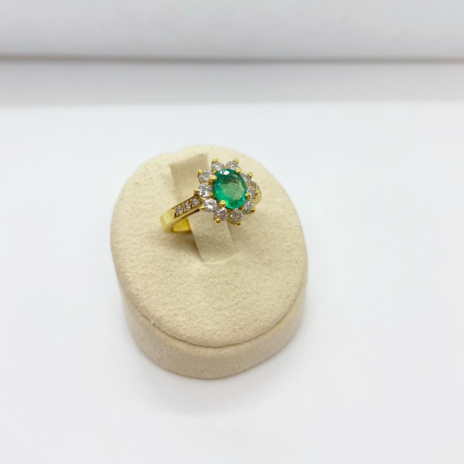 Retro 18 Karat Yellow Gold, .86 Carat Oval Emerald Ring with .75 Carat Diamonds For Sale