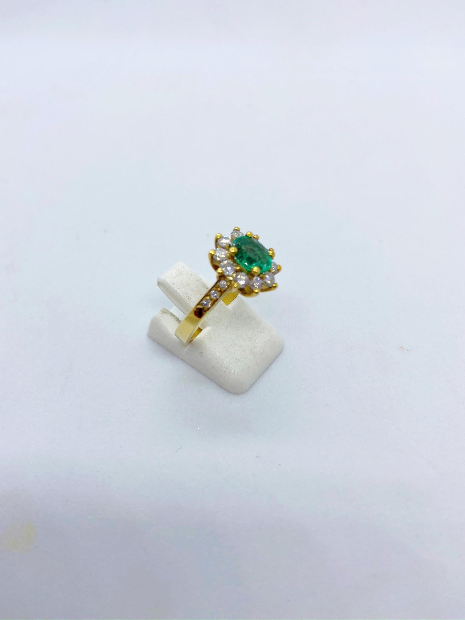 Oval Cut 18 Karat Yellow Gold, .86 Carat Oval Emerald Ring with .75 Carat Diamonds For Sale