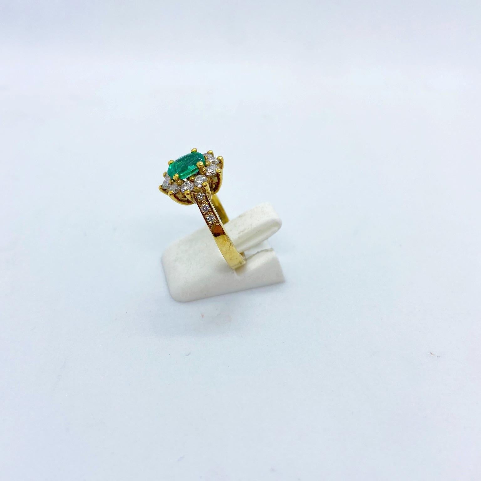 18 Karat Yellow Gold, .86 Carat Oval Emerald Ring with .75 Carat Diamonds In New Condition For Sale In New York, NY