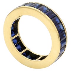 18 Karat Yellow Gold 8.95 Carat Emerald-Cut Sapphire Eternity Band Ring