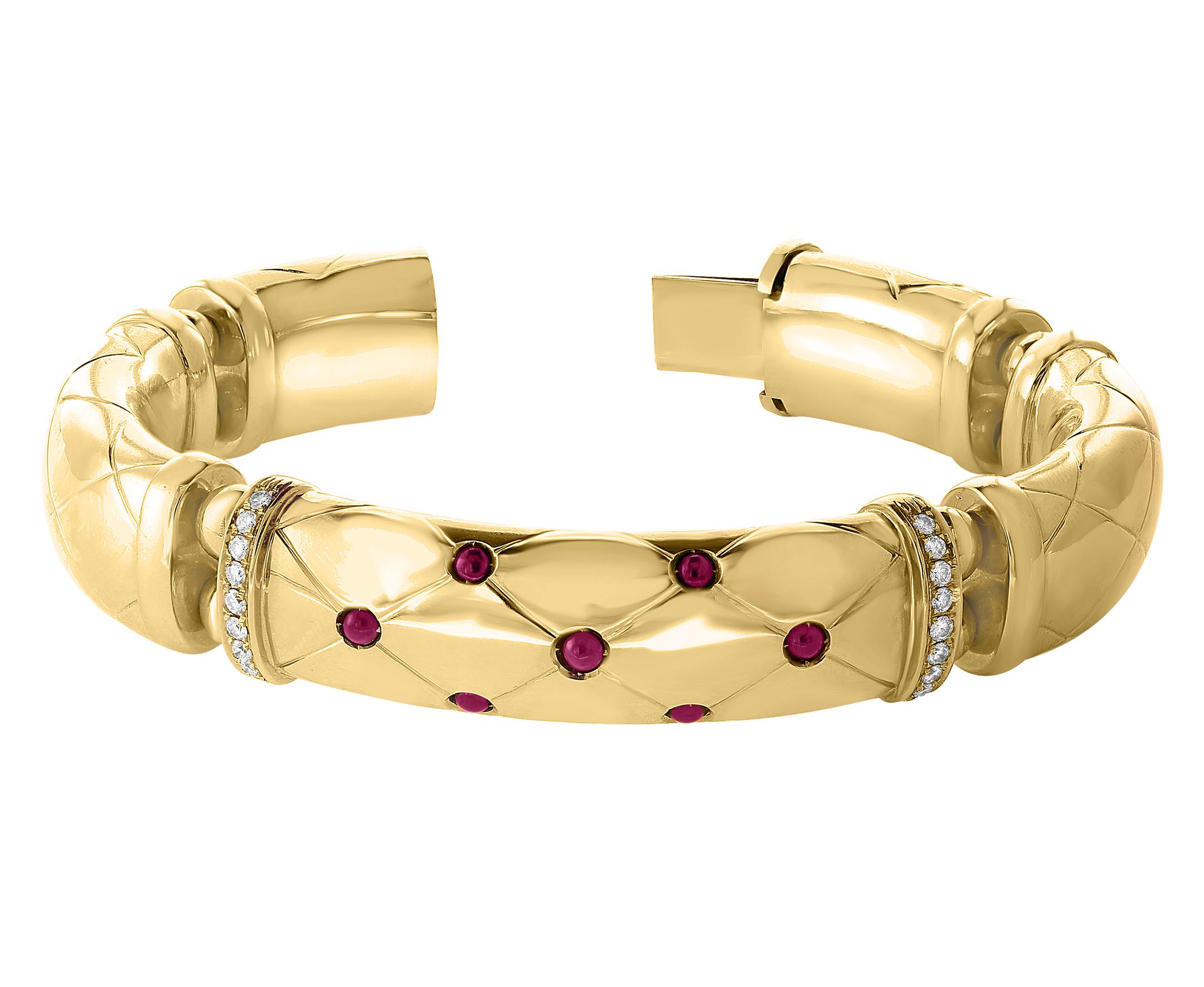  Very Heavy   Bangle  featuring  Ruby   Cabochon  and Diamonds 

18 Karat Yellow Gold 94 Grams 
Authenticity and money back is guaranteed.