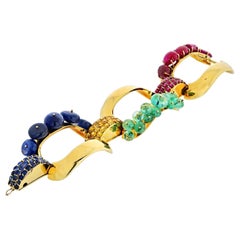 Bracelet à trois maillons en or jaune 18 carats et pierres précieuses, c. 1950