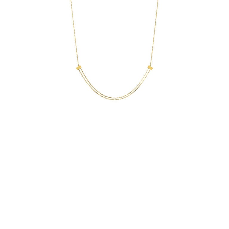 A necklace with two adjustable rectangle cubes. The cubes can be moved along the chain for various styling and length possibilities.

18 Karat Yellow Gold Adjustable Cube Necklace
Chain length: 800mm
Single cube diameter: 3.6mm x 6.24mm x