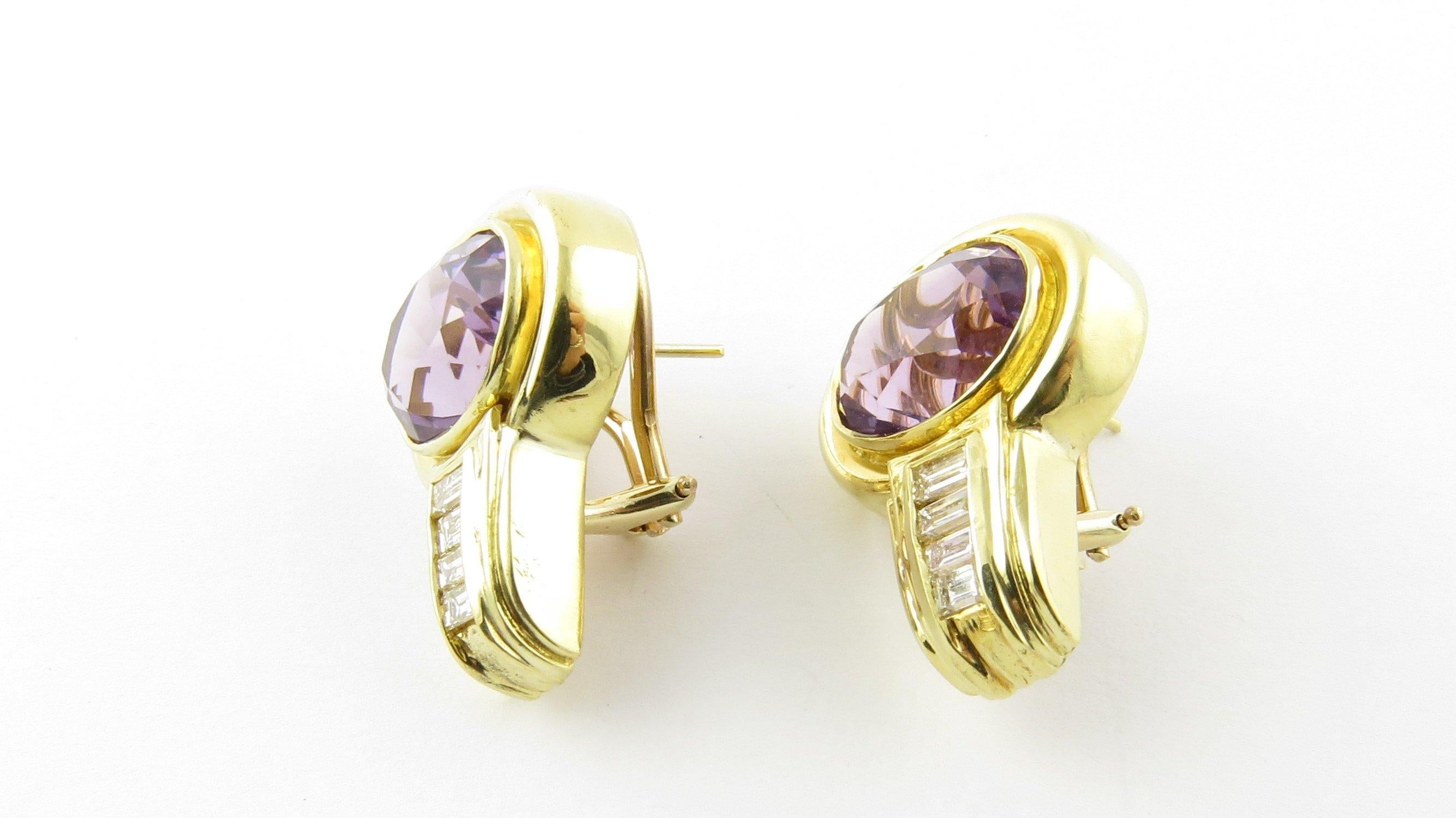 These stunning earrings each feature one oval genuine amethyst (12 mm x 9 mm) accented with four baguette diamonds and set in beautifully detailed polished 18K yellow gold.  Hinge back closures.



Approximate total diamond weight:  .50