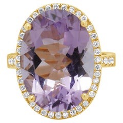 18 Karat Yellow Gold Amethyst and Diamond Halo Ring