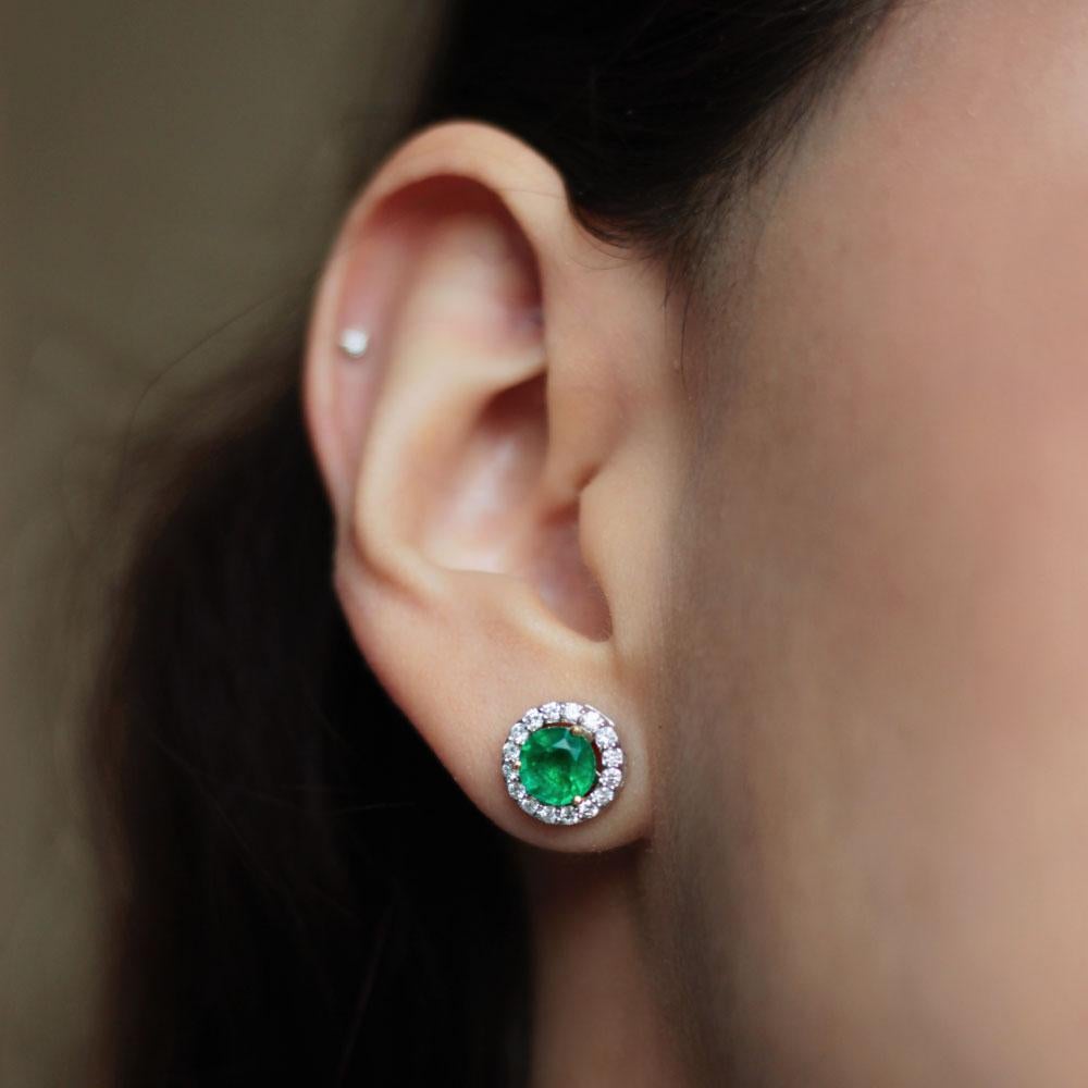 The Bloom collection consists of a gorgeous center solitaire surrounded by a halo of precious and semiprecious stones.

Product Name: Emerald Studs
Stones: Emerald 1 ct
Metal: 18K Yellow Gold
2.93 grams Gold Weight