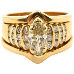 18 Karat Yellow Gold and 1.10 Carat Marquise Diamond Ring with Accents