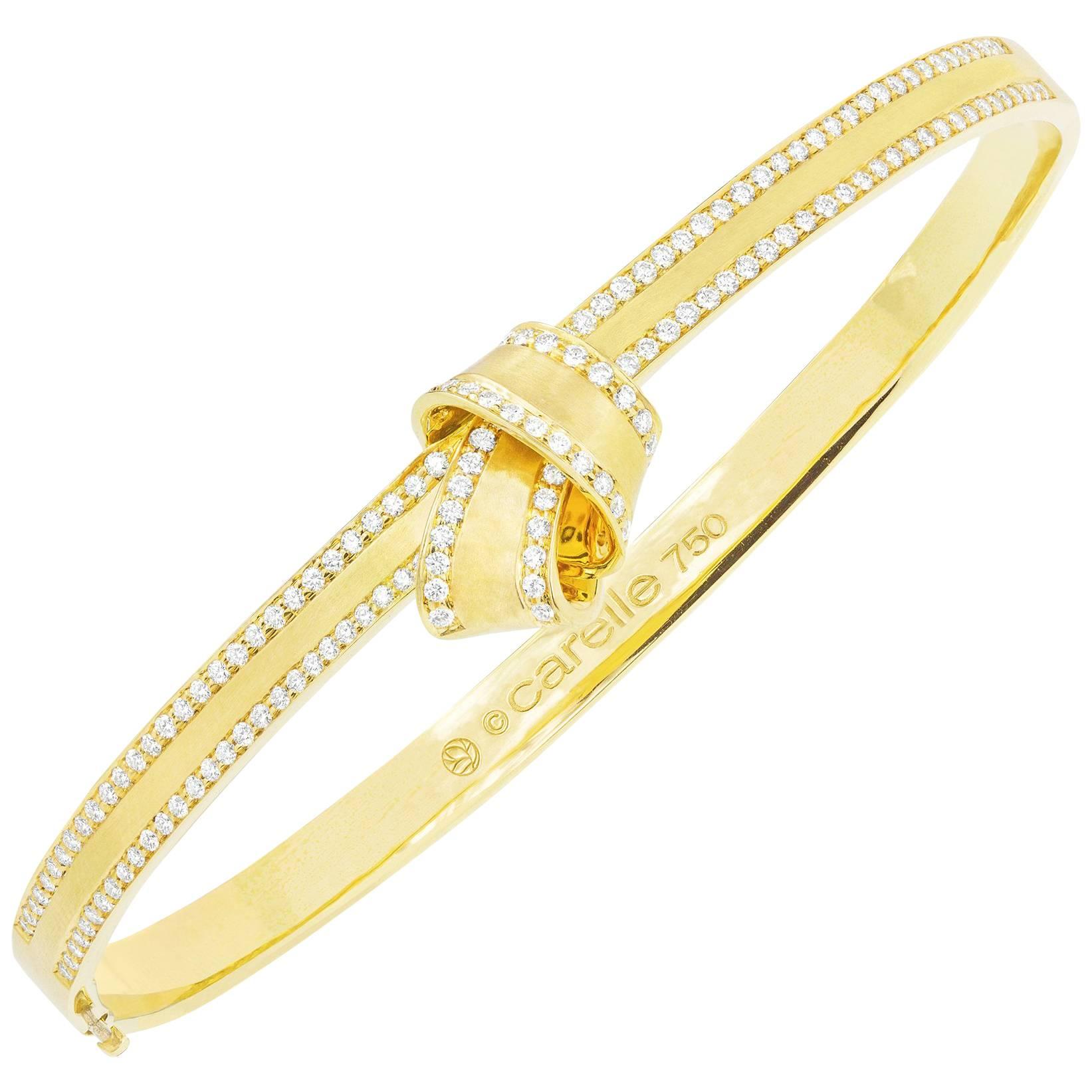 18 Karat Yellow Gold and .71 Carat Diamond Carelle Knot Trim Bangle Bracelet For Sale