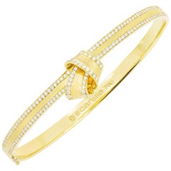 18 Karat Yellow Gold and .71 Carat Diamond Carelle Knot Trim Bangle Bracelet