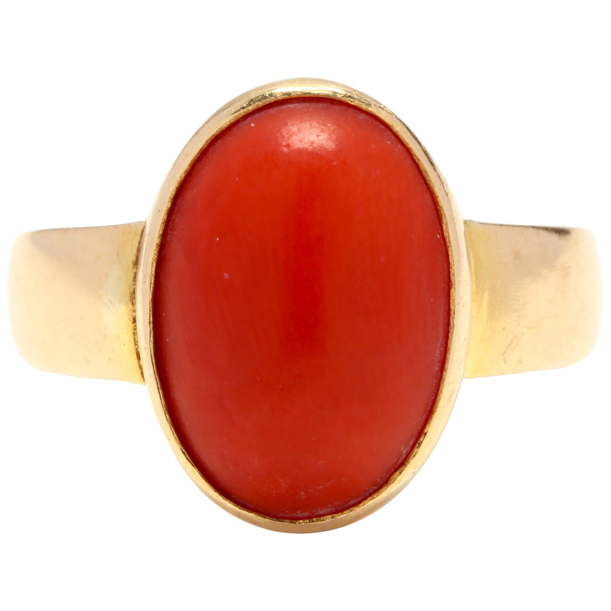 18 Karat Yellow Gold and Bezel Set Coral Solitaire Ring