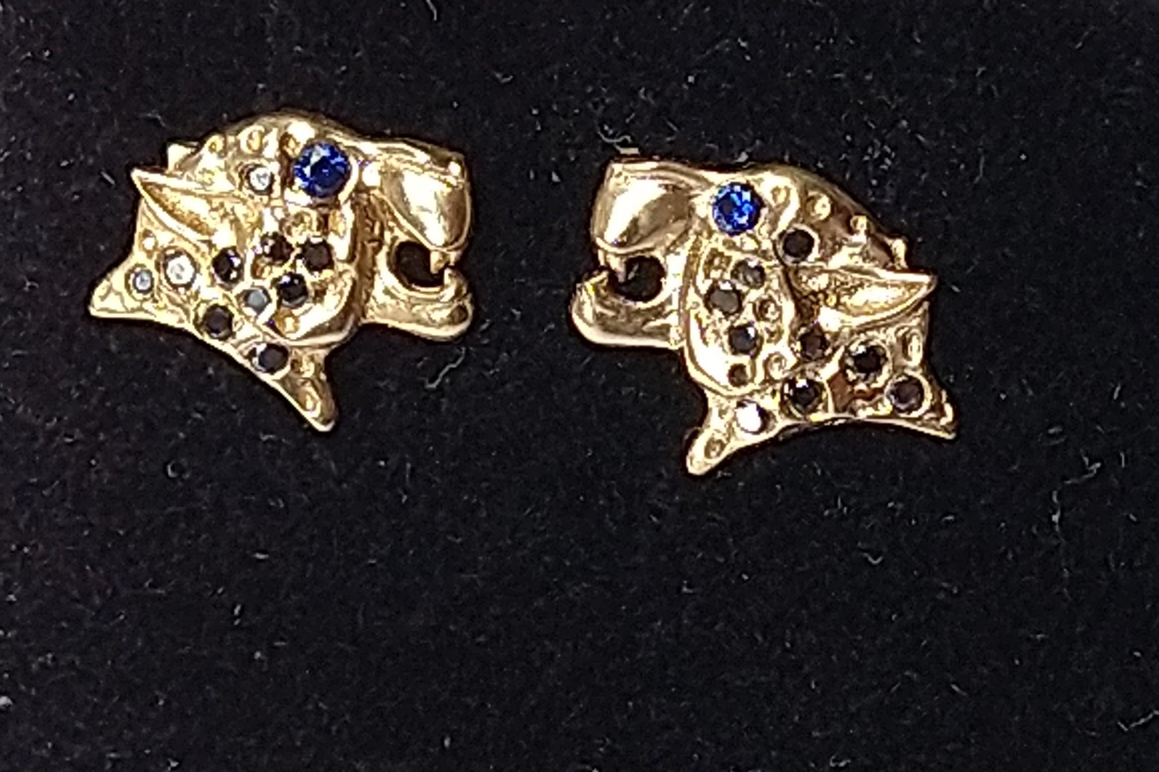 18 Karat Yellow Gold Black Diamonds , Blue Sapphire eyes Leopard stud earrings, Tiffany designer Thomas Kurilla went back to the archives in the collection of metal stampings  The leopard, one of the fastest land animals. Beautiful spots, elegant in
