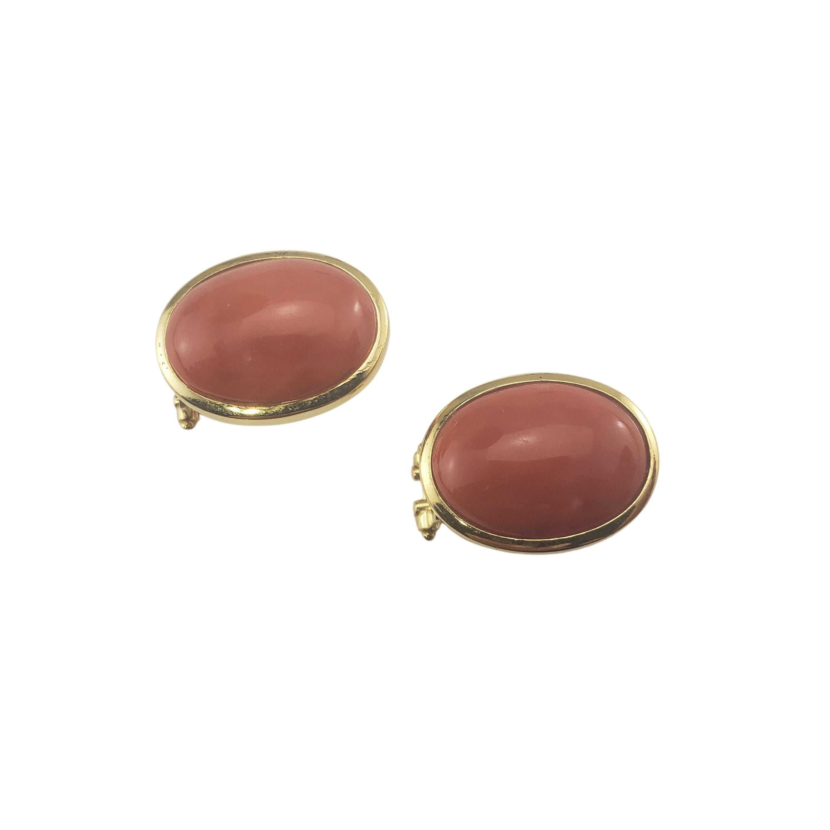 18 Karat Yellow Gold and Carnelian Earrings-

These elegant earrings each features one oval carnelian* gemstone (15 mm x 12 mm) set in classic 18K yellow gold.  Hinged closures.

*Chip noted to back of one stone not visible when being worn.

Size: