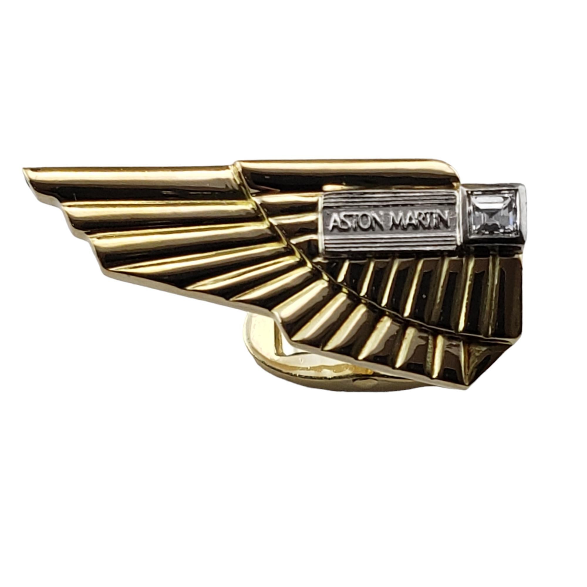 Vintage 18 Karat Yellow Gold and Diamond Aston Martin Cufflinks-

These elegant Aston Martin logo cufflinks are crafted in beautifully detailed 18K yellow gold.

Approximate total diamond weight:

Diamond color:

Diamond clarity:

Size: 24 mm x 11