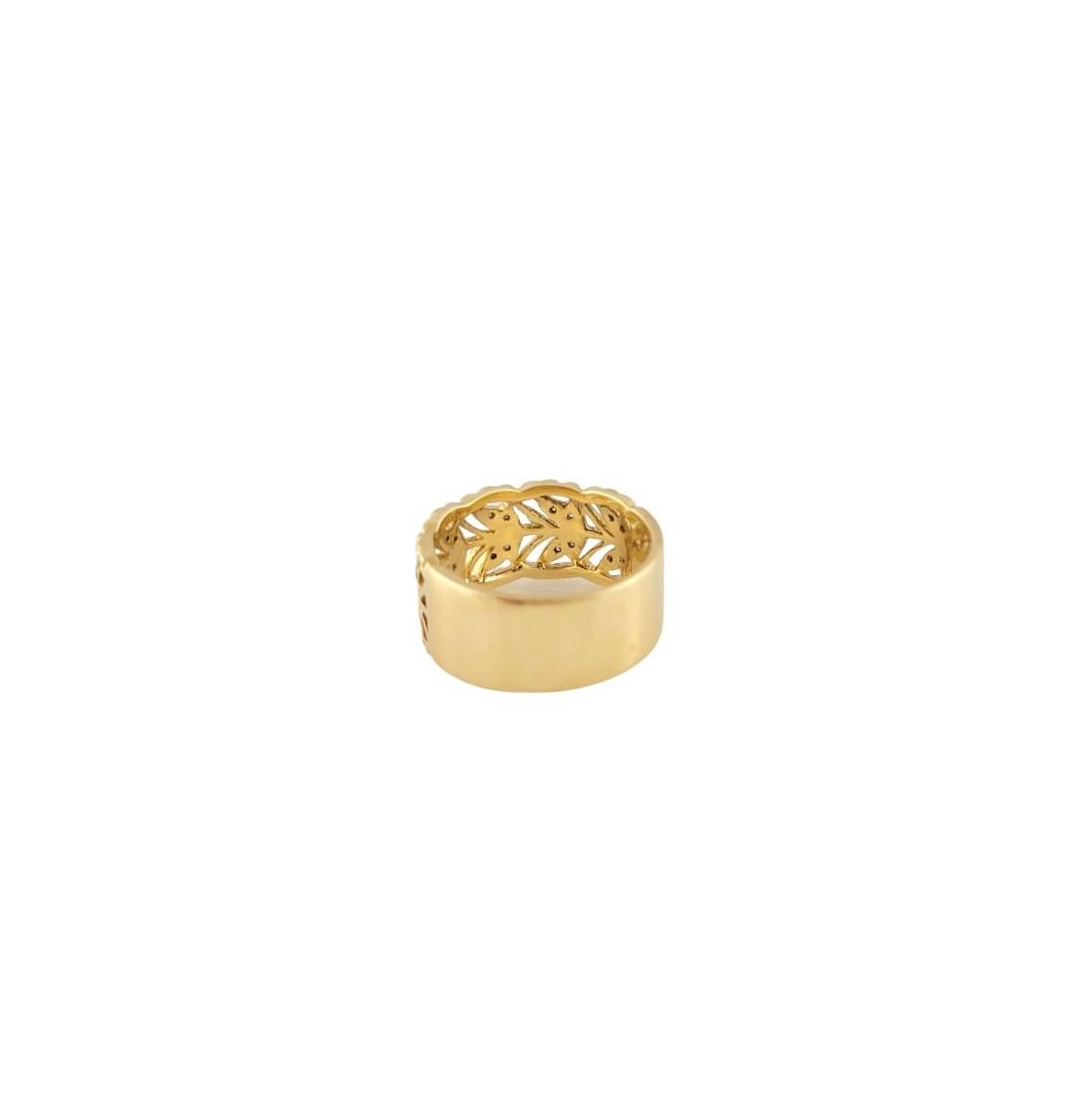 This elegant band features 20 round brilliant cut diamonds set in classic 18K yellow gold.  Width: 10 mm.

Shank: 9 mm.

Approximate total diamond weight:  .10 ct.

Diamond color:  G-H

Diamond clarity:  SI1-I1

Size:  6.5

Weight:  7.6 gr./  4.8