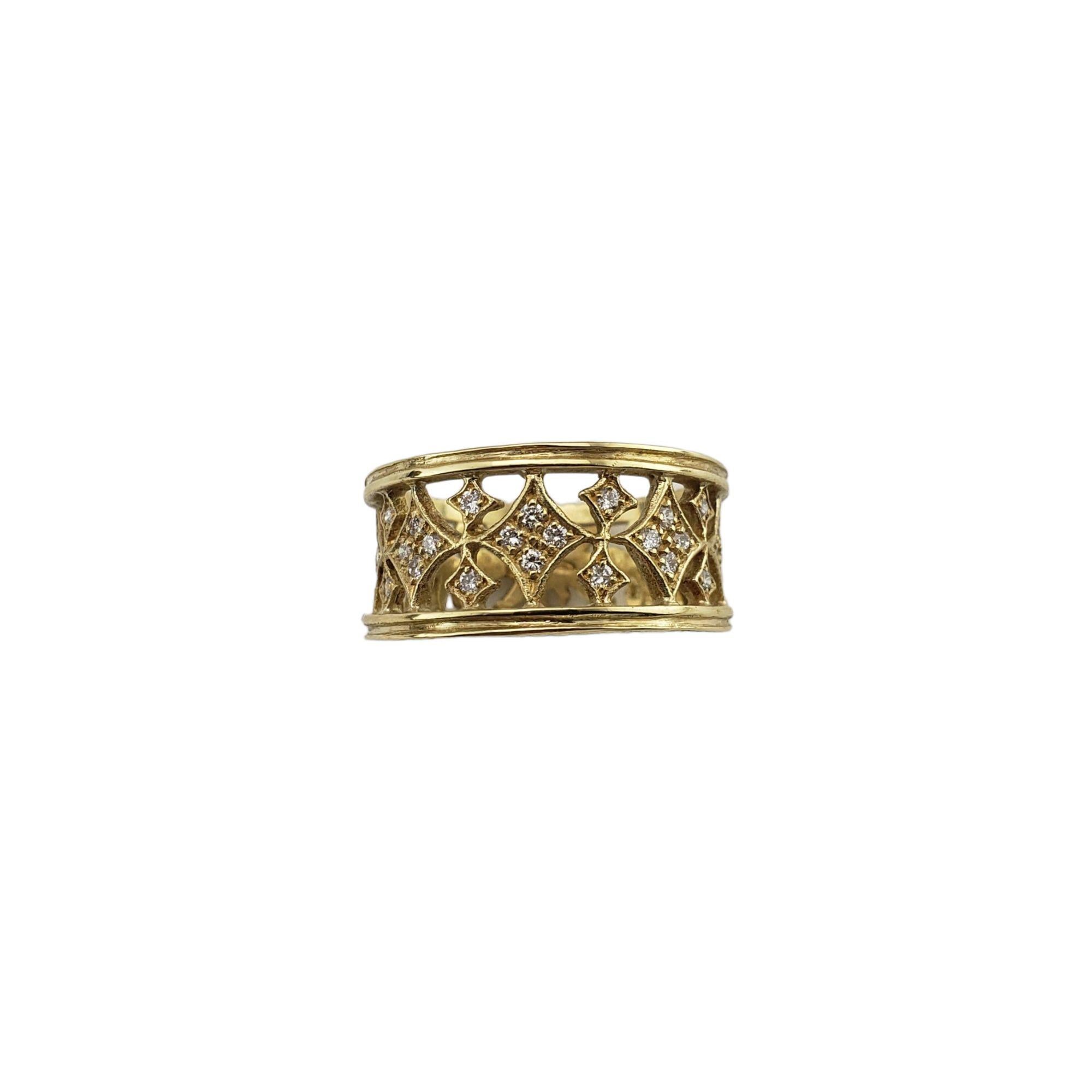 Vintage 18 Karat Yellow Gold and Diamond Band Ring Size 7-

This lovely band features 28 round brilliant cut diamonds set in beautifully detailed 18K yellow gold. Width: 9 mm.

Total diamond weight: .28 ct.

Diamond clarity: VS1

Diamond color: