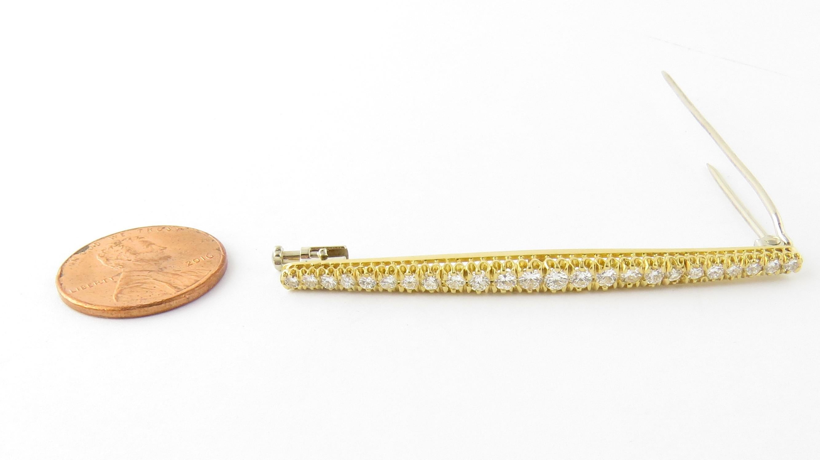 Vintage 18 Karat Yellow Gold and Diamond Bar Pin.

This stunning piece features 24 round brilliant cut diamonds set in classic 18K yellow gold.

Approximate total diamond weight: .40 ct.

Diamond color: G

Diamond clarity: VS2

Size: 58 mm x 5