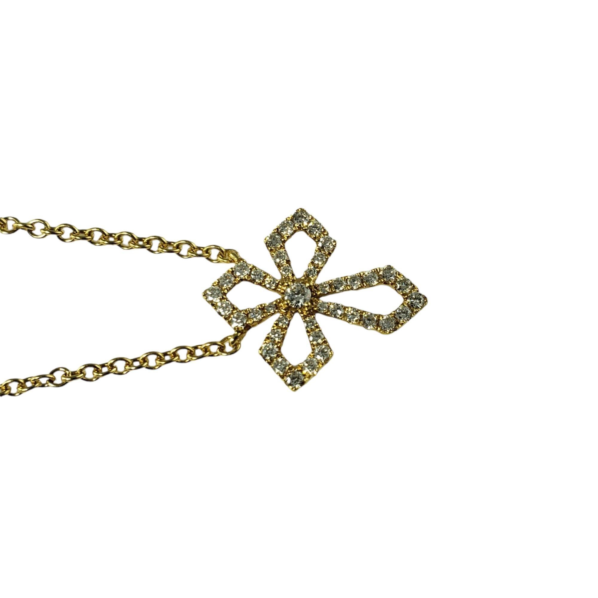 Vintage 18 Karat Yellow Gold Diamond Cross Pendant Necklace-

This sparkling cross pendant features 41 round brilliant diamonds set in classic 18K yellow gold. Suspends from a classic cable chain.

Approximate total diamond weight: .21 ct.

Diamond