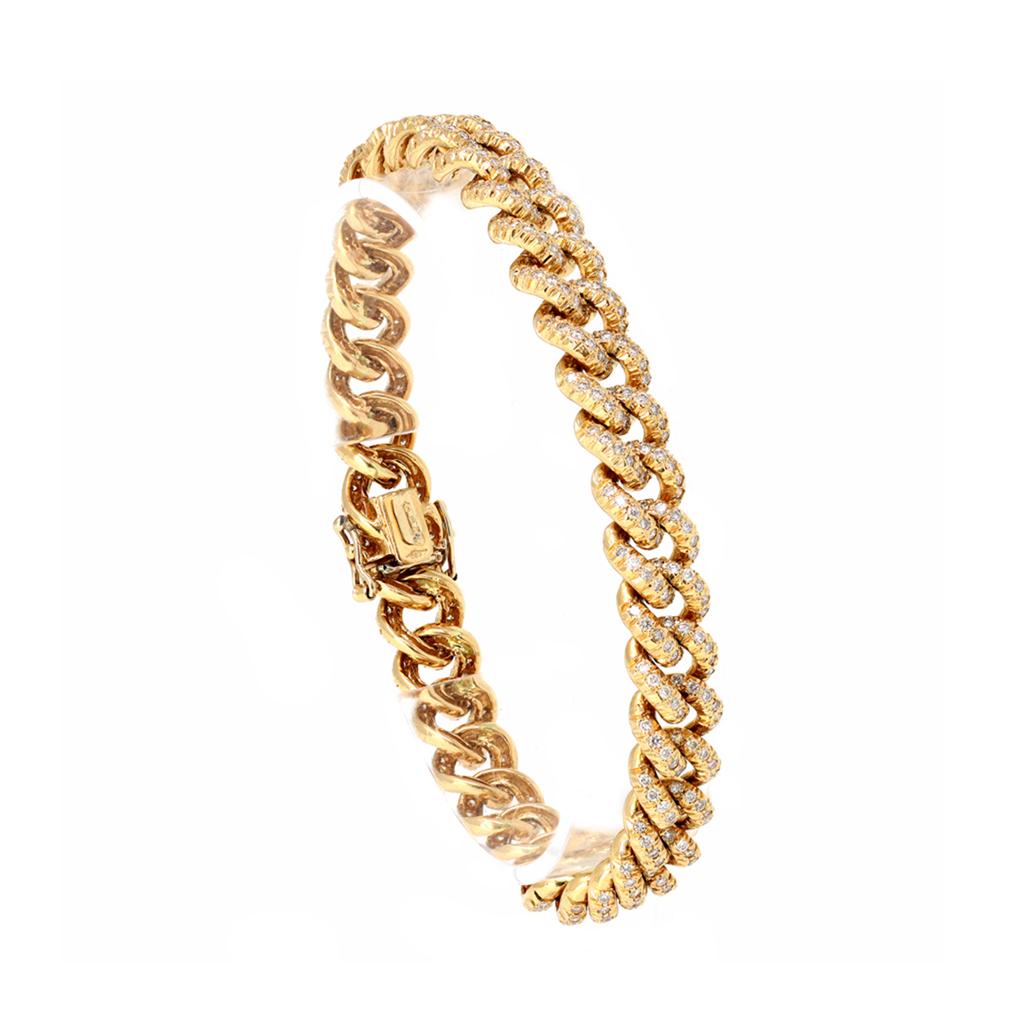 A classic curb link also called Gourmette bracelet made in Italy. The 18 karat yellow gold bracelet is set all around with round full cut diamonds in a pave fashion. The estimated weight of the diamonds is 3.58 carats GH color VS-SI clarity. The