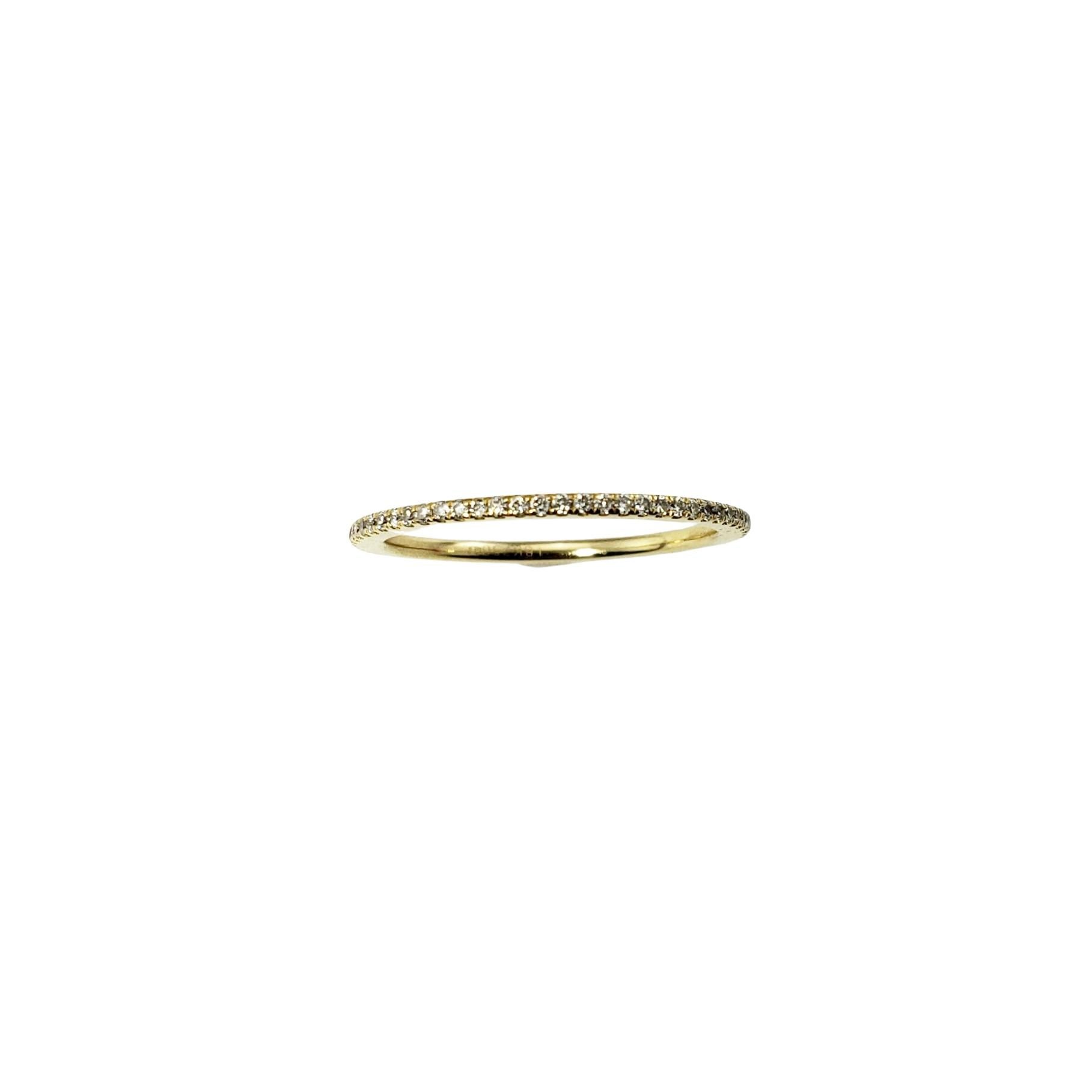 18 Karat Yellow Gold and Diamond Eternity Band Ring Size 5-

This sparkling eternity band features 66 round brilliant cut diamonds set in classic 18K yellow gold.  Width:  1 mm.

Approximate total diamond weight: .33 ct.

Diamond color: I

Diamond